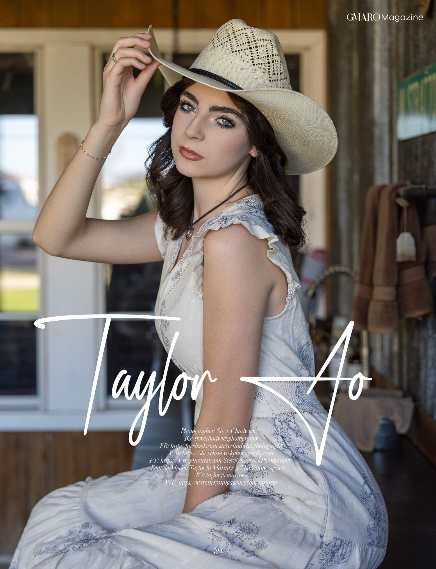 Brunette model in white dress and cowboy hat featured in GMABO Magazine Taylor Ao spread.