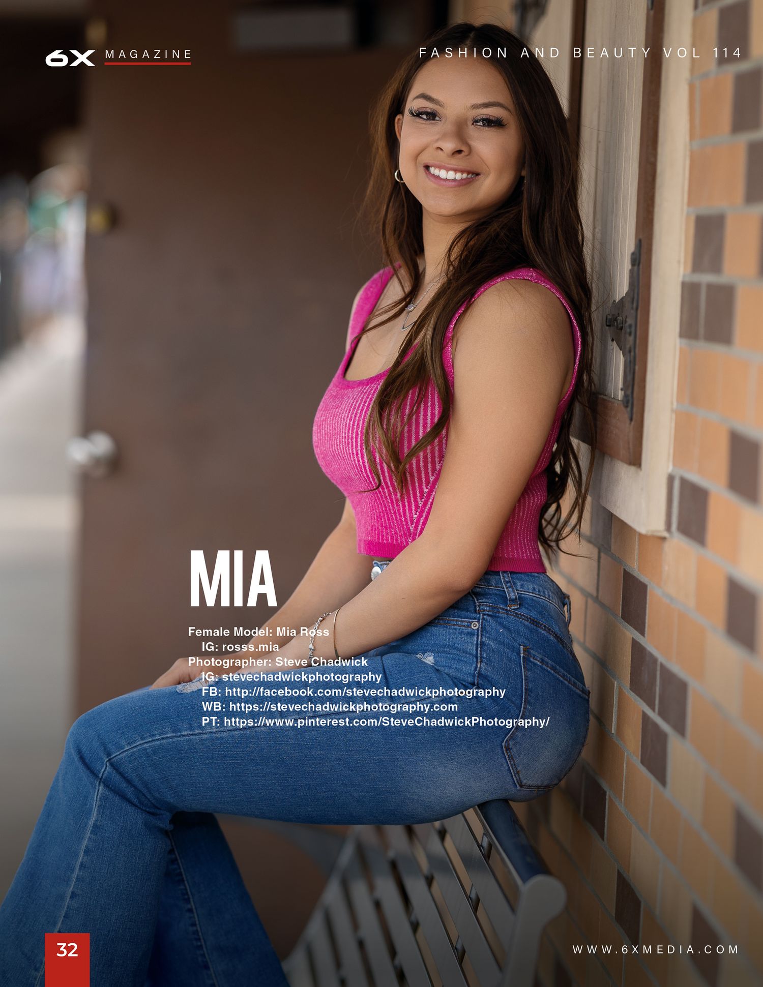 Model Mia poses in pink top and jeans against brick wall for 6X Magazine fashion feature.