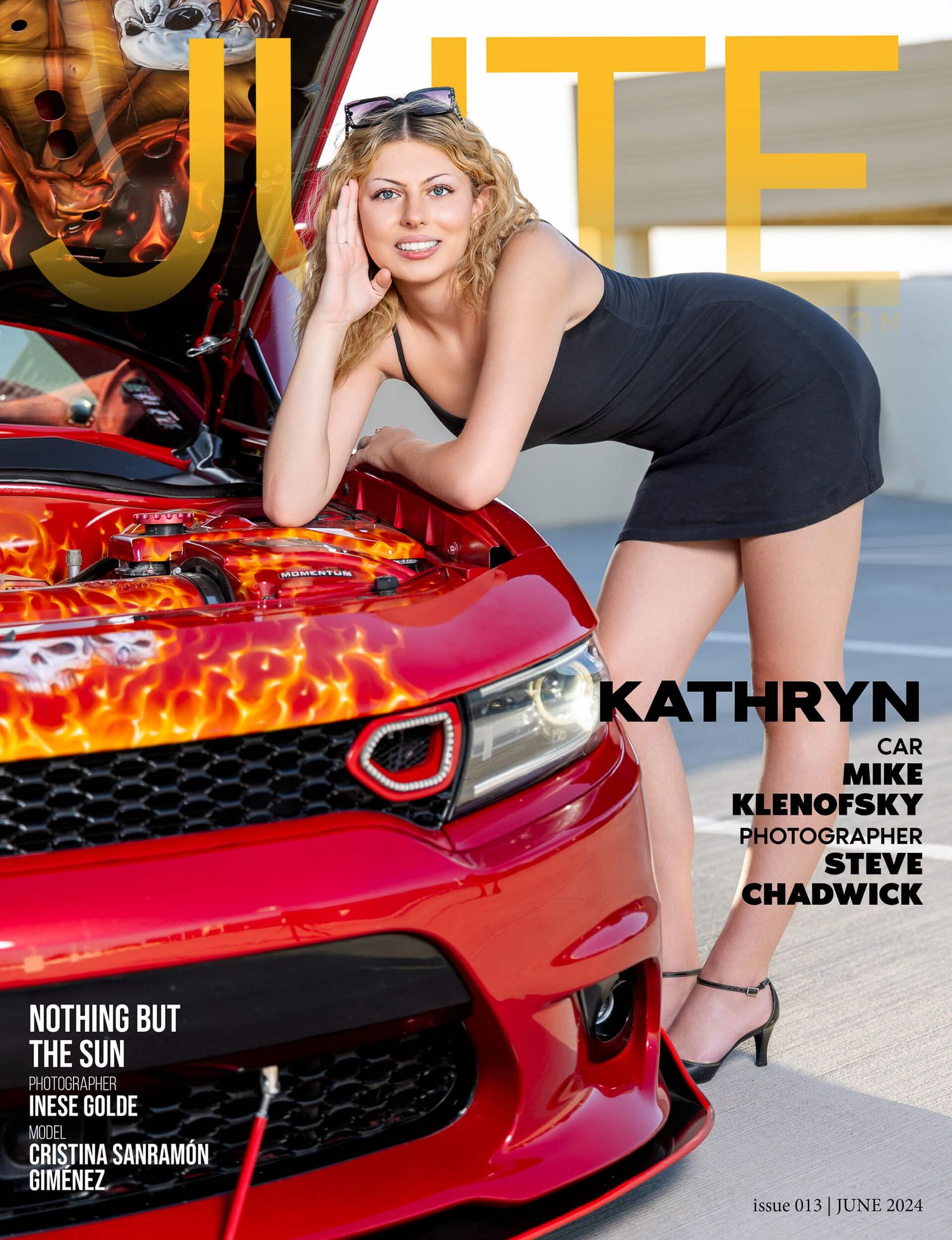 Model Kathryn leans over red custom car engine for JUTE Magazine June 2024 automotive cover.