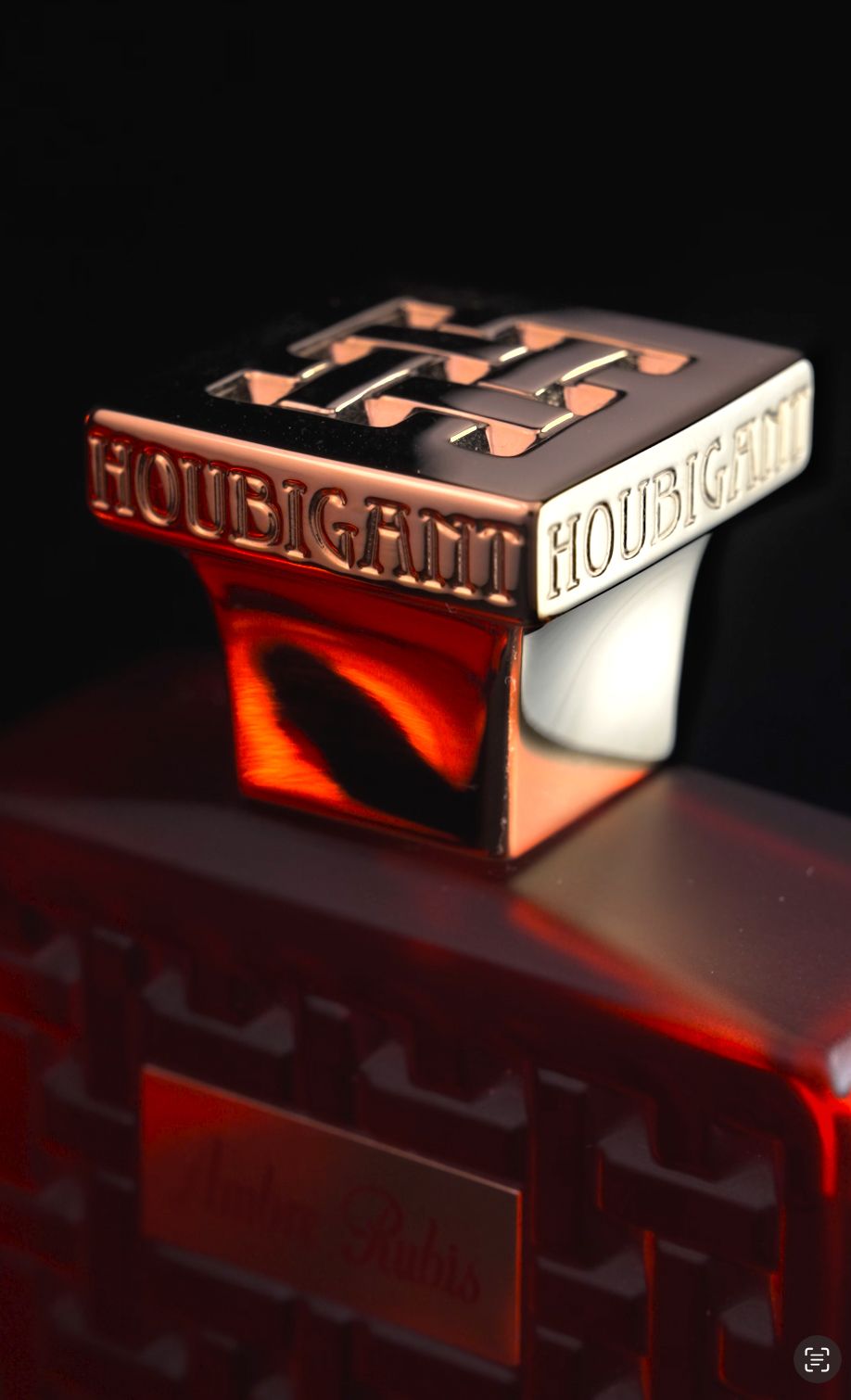 Cinematic perfume photography with luxury red reflections for Houbigant Paris