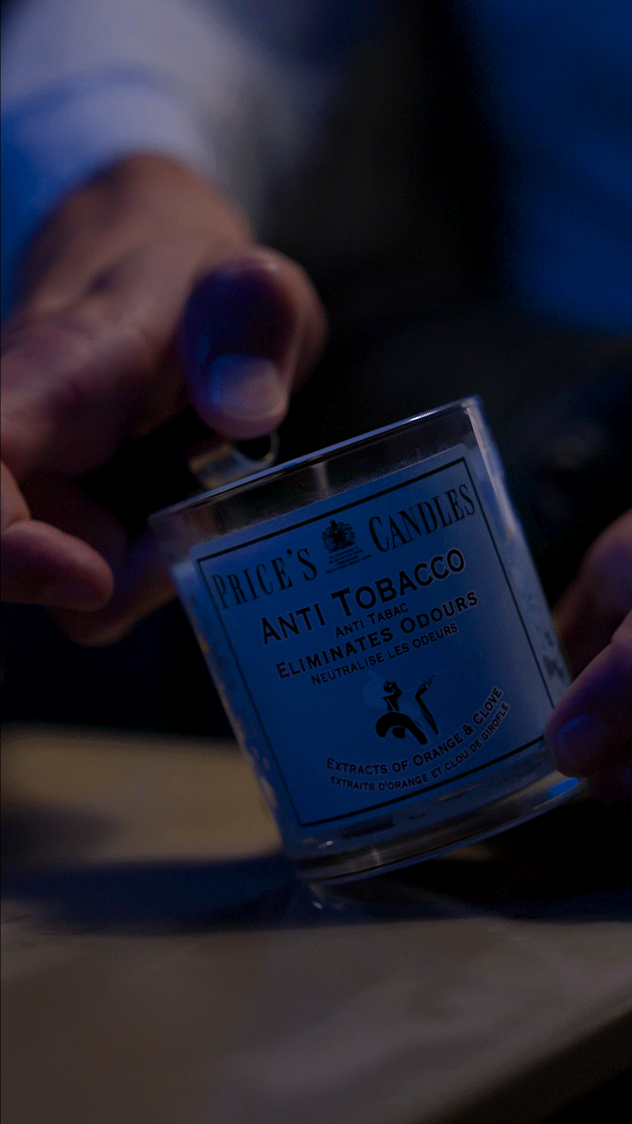 Cinematic close-up of a luxury scented candle with dramatic lighting and premium product cinematography.