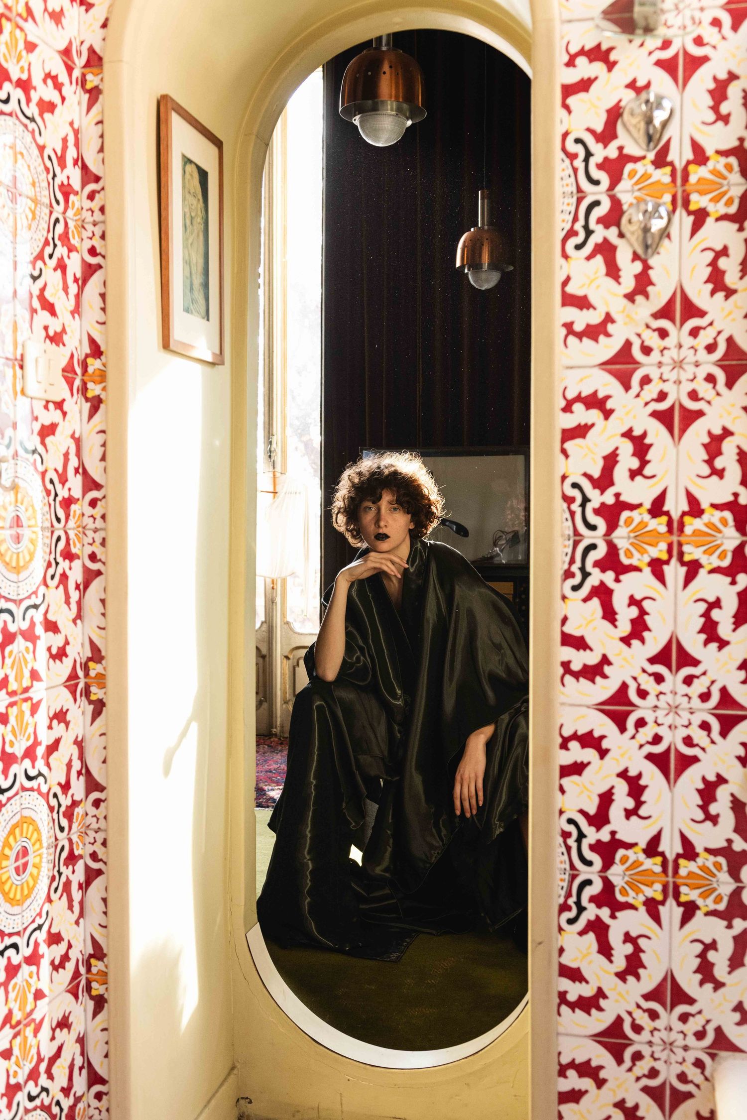 Cinematic portrait inside Casa Mollino, bathroom with vintage tiles