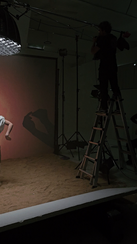 Behind-the-scenes cinematic lighting setup for a creative commercial production and visual storytelling.