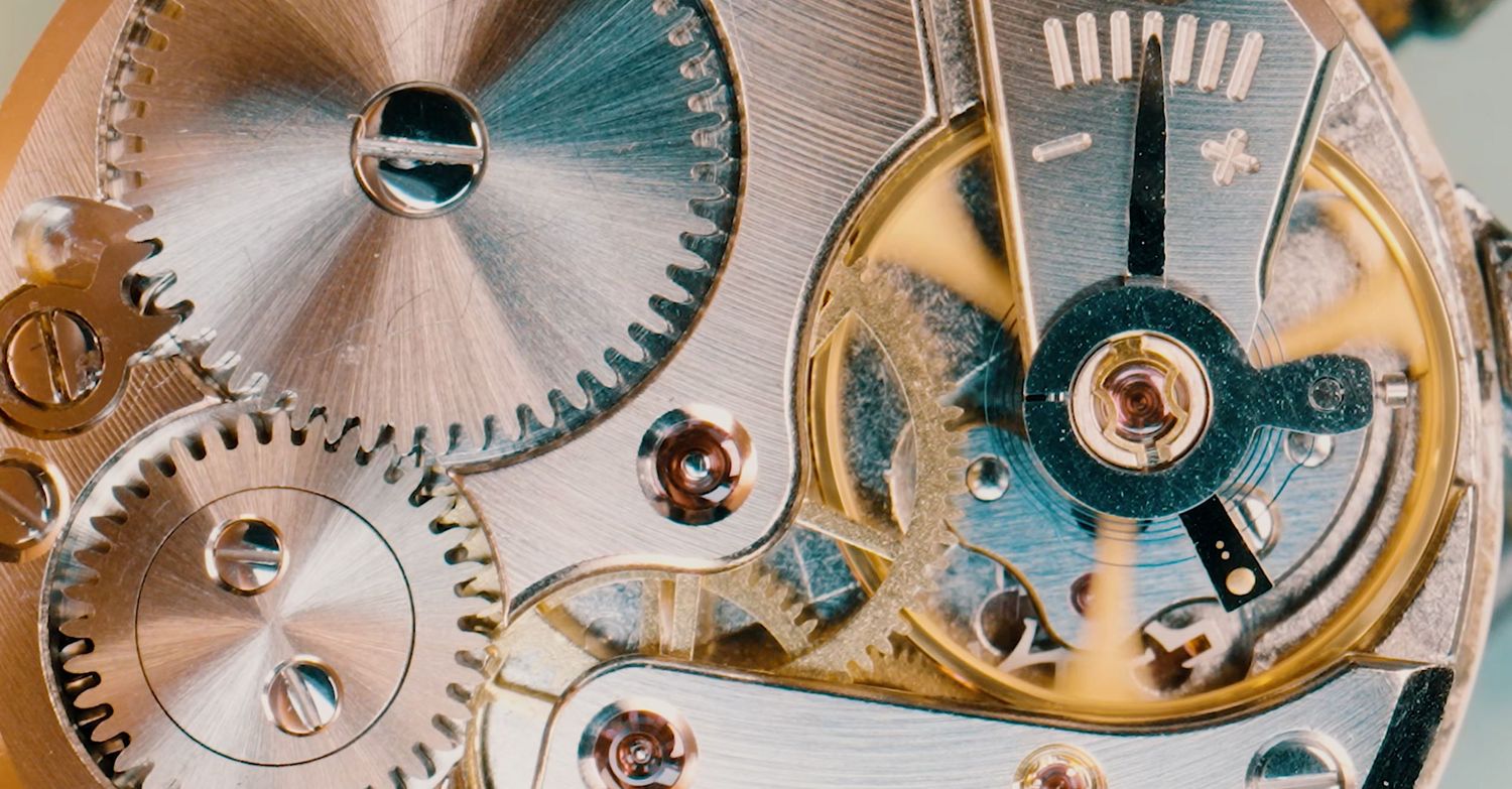 Macro luxury watch movement photography with cinematic detail