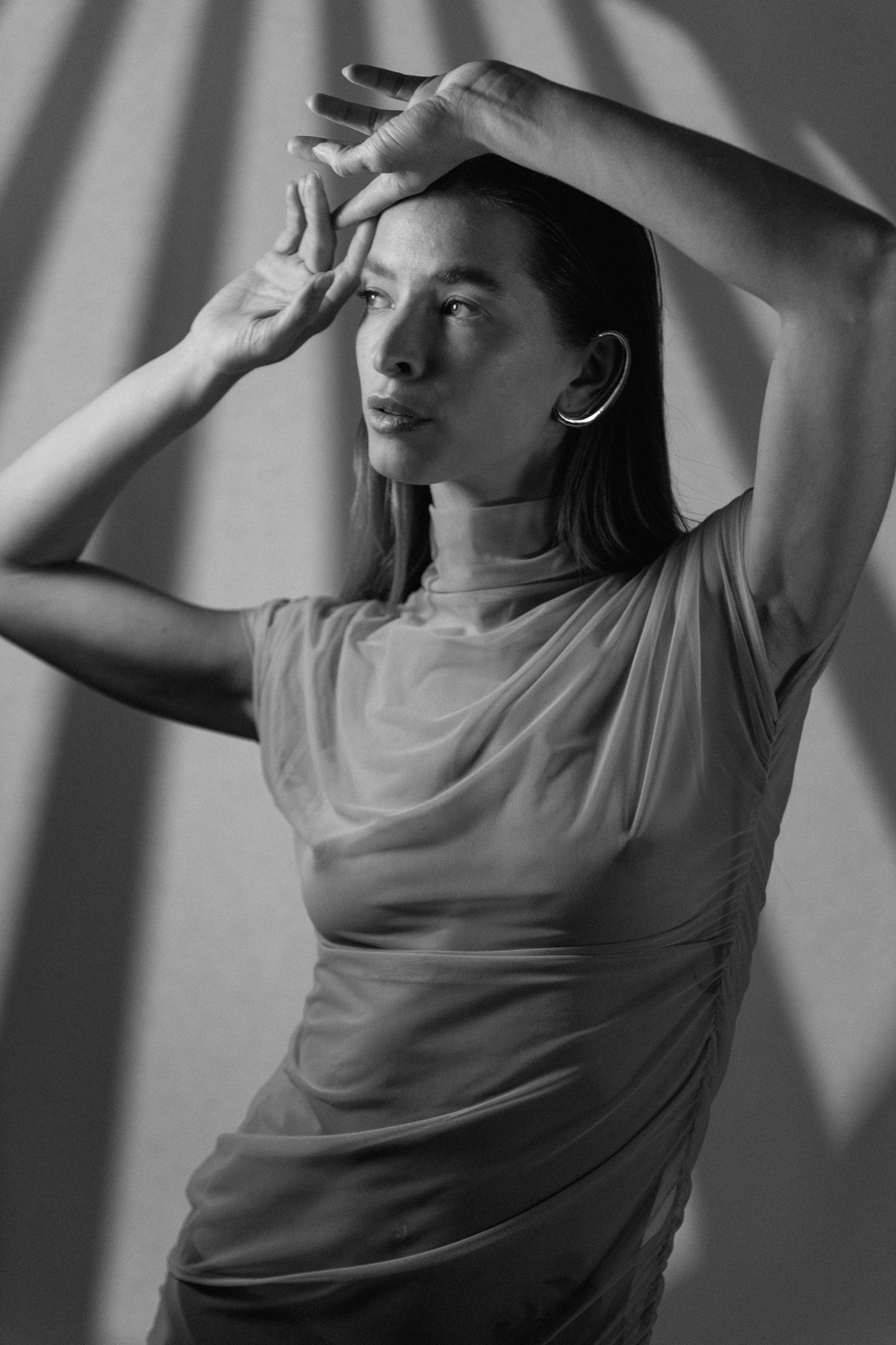 Black and white artistic fashion portrait with cinematic composition