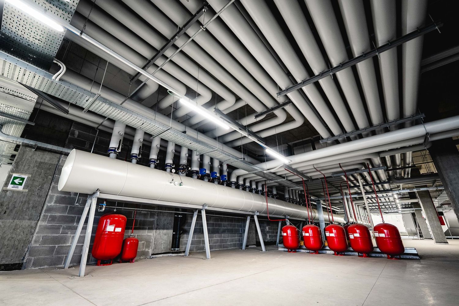 Modern industrial architecture photography with geometric composition and cinematic perspective for Comat SPA
