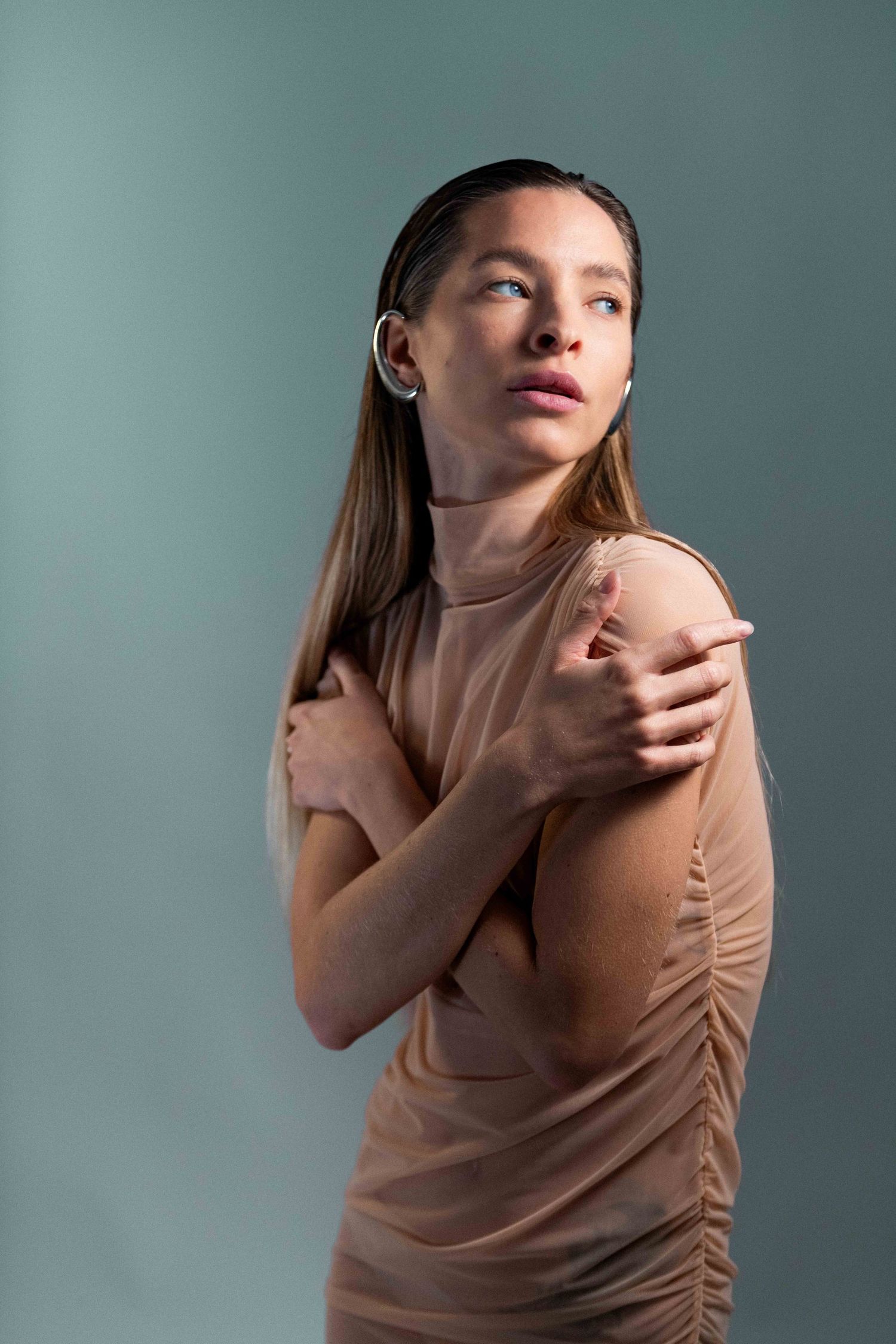Minimal fashion portrait photography with soft studio lighting