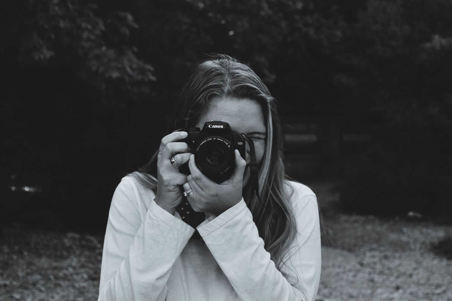 Alaina Joy, owner and lead photographer at Alaina Joy Photograph, specializing in vibrant family, newborn, and senior photography in Plano.