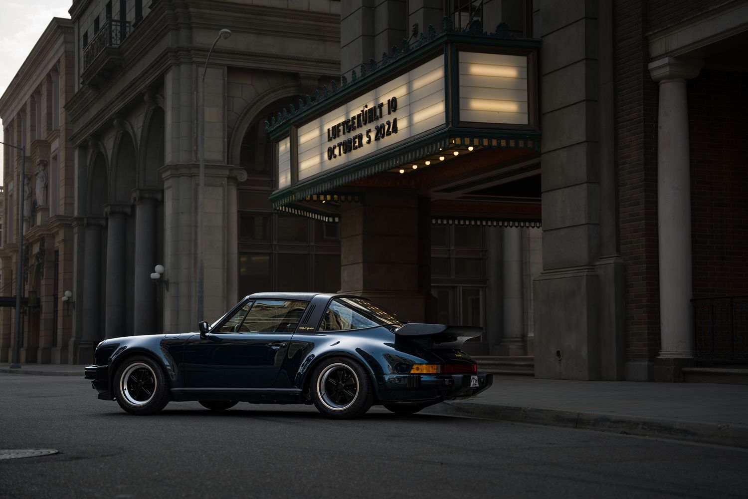 Black Porsche at the movie theater
