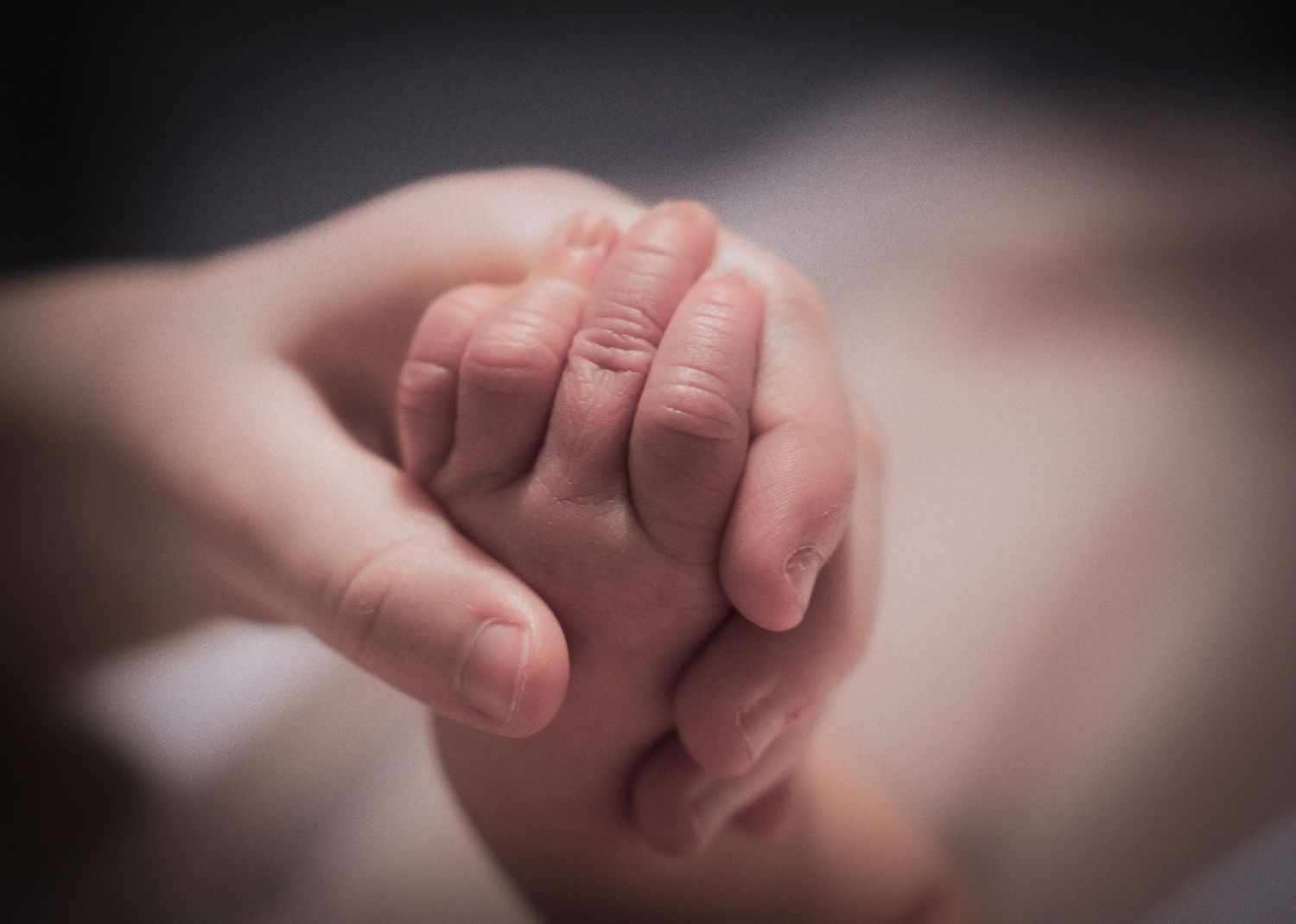 Extreme close-up of hands with shallow depth of field.