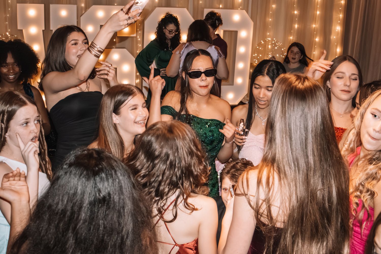 Image of Victoria's School of Dance dancers celebrating at their National Dance Honors Society induction ceremony