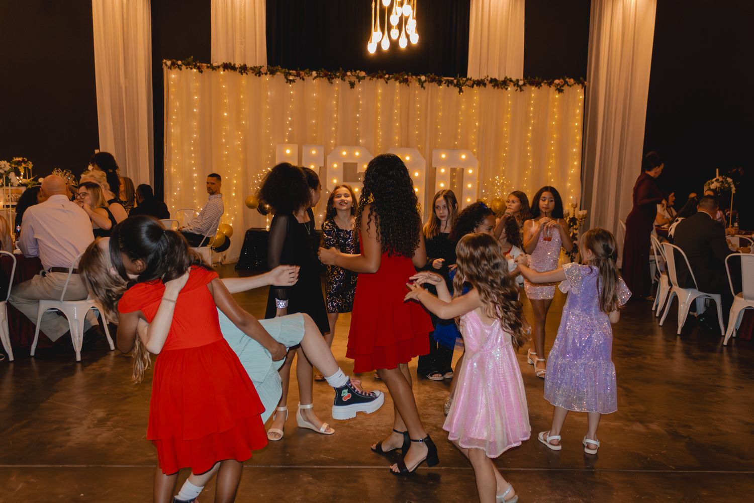 Image of Victoria's School of Dance dancers celebrating at their National Dance Honors Society induction ceremony