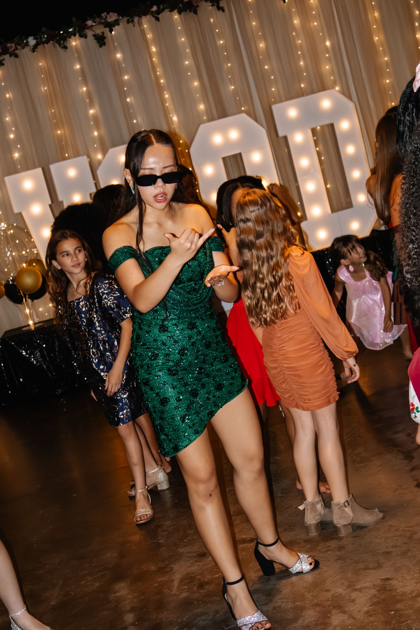 Image of Victoria's School of Dance dancers celebrating at their National Dance Honors Society induction ceremony