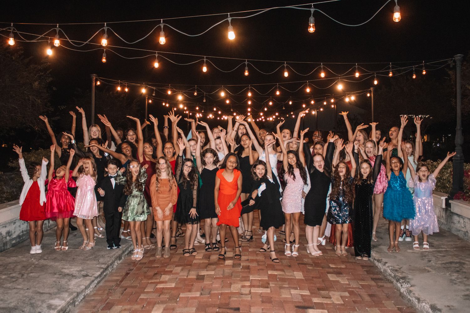 Image of Victoria's School of Dance dancers celebrating at their National Dance Honors Society induction ceremony