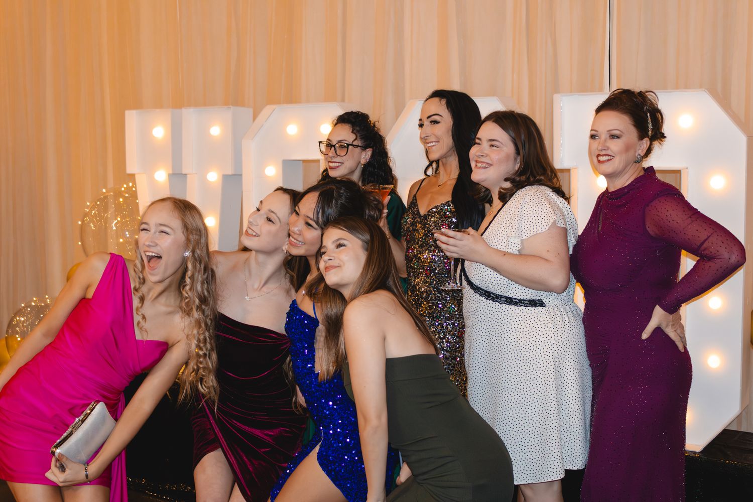 Image of Victoria's School of Dance dancers celebrating at their National Dance Honors Society induction ceremony
