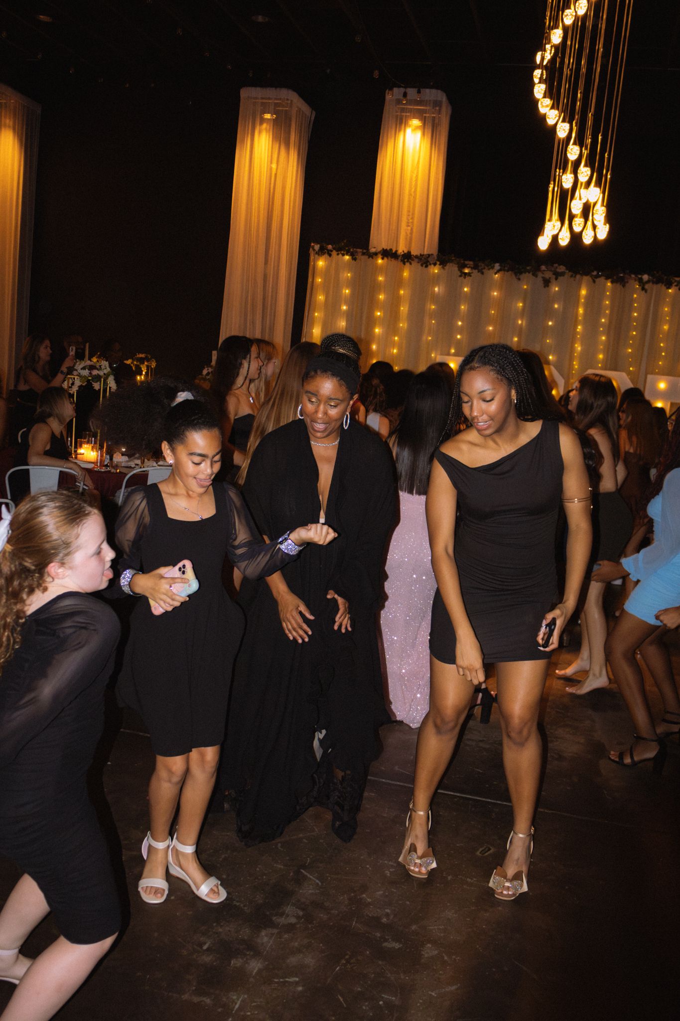 Image of Victoria's School of Dance dancers celebrating at their National Dance Honors Society induction ceremony