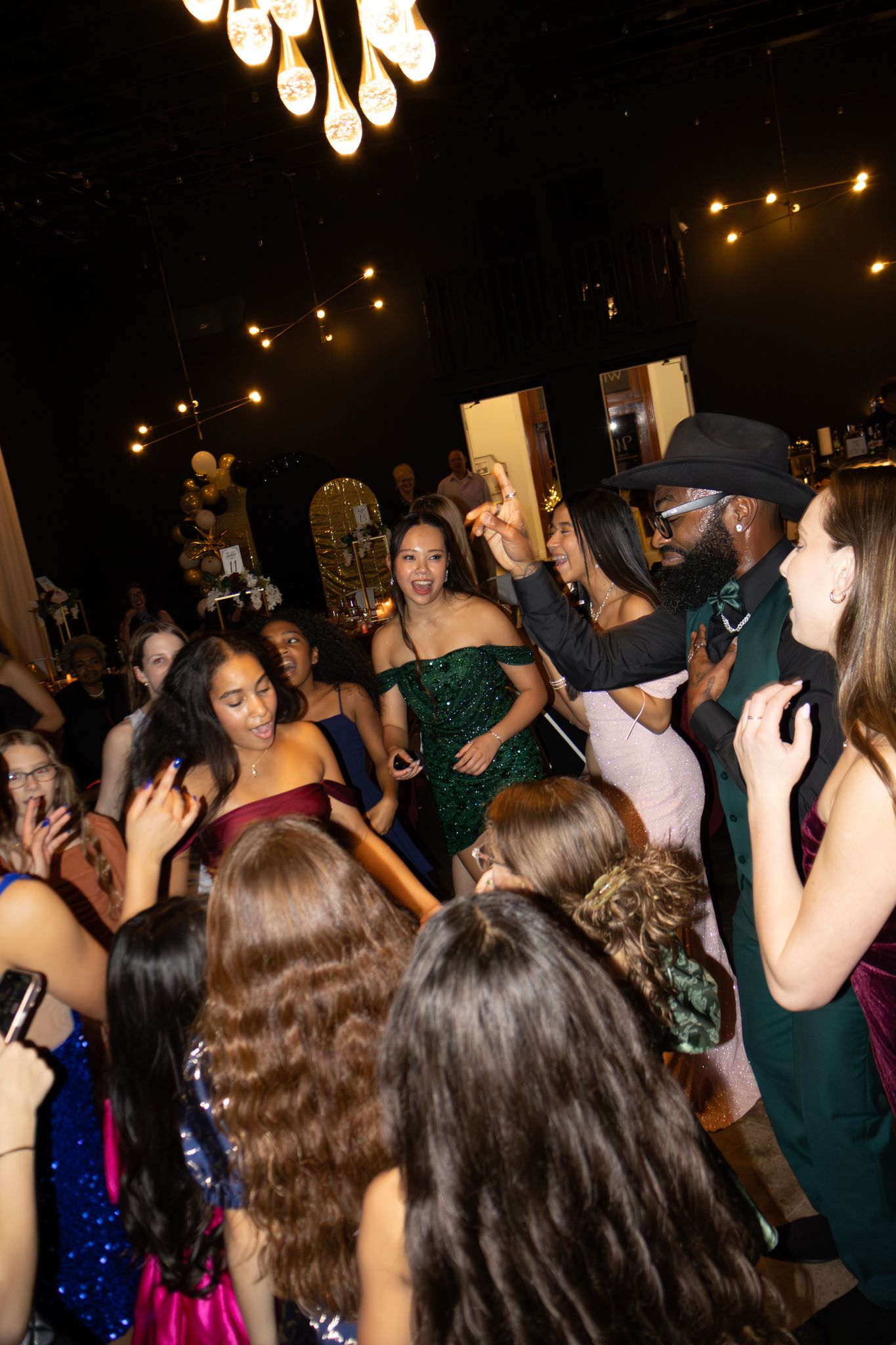 Image of Victoria's School of Dance dancers celebrating at their National Dance Honors Society induction ceremony