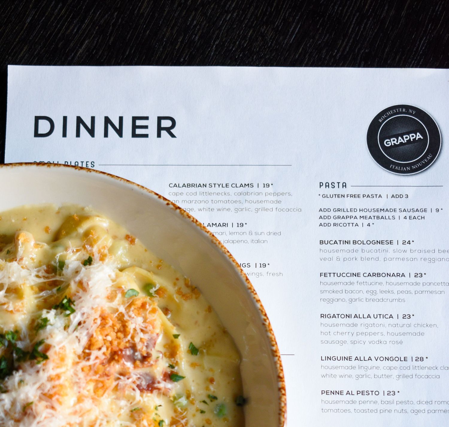 Grappa Italian Nouveau dinner menu featuring pasta dishes including Bucatini Bolognese and Linguine alla Vongole.