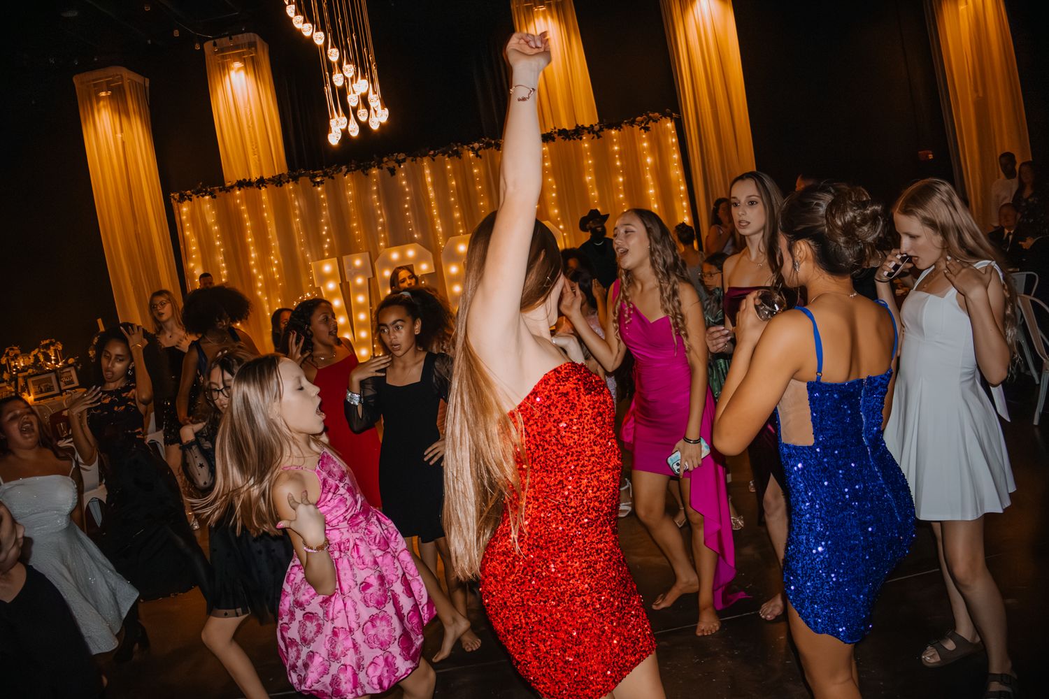 Image of Victoria's School of Dance dancers celebrating at their National Dance Honors Society induction ceremony