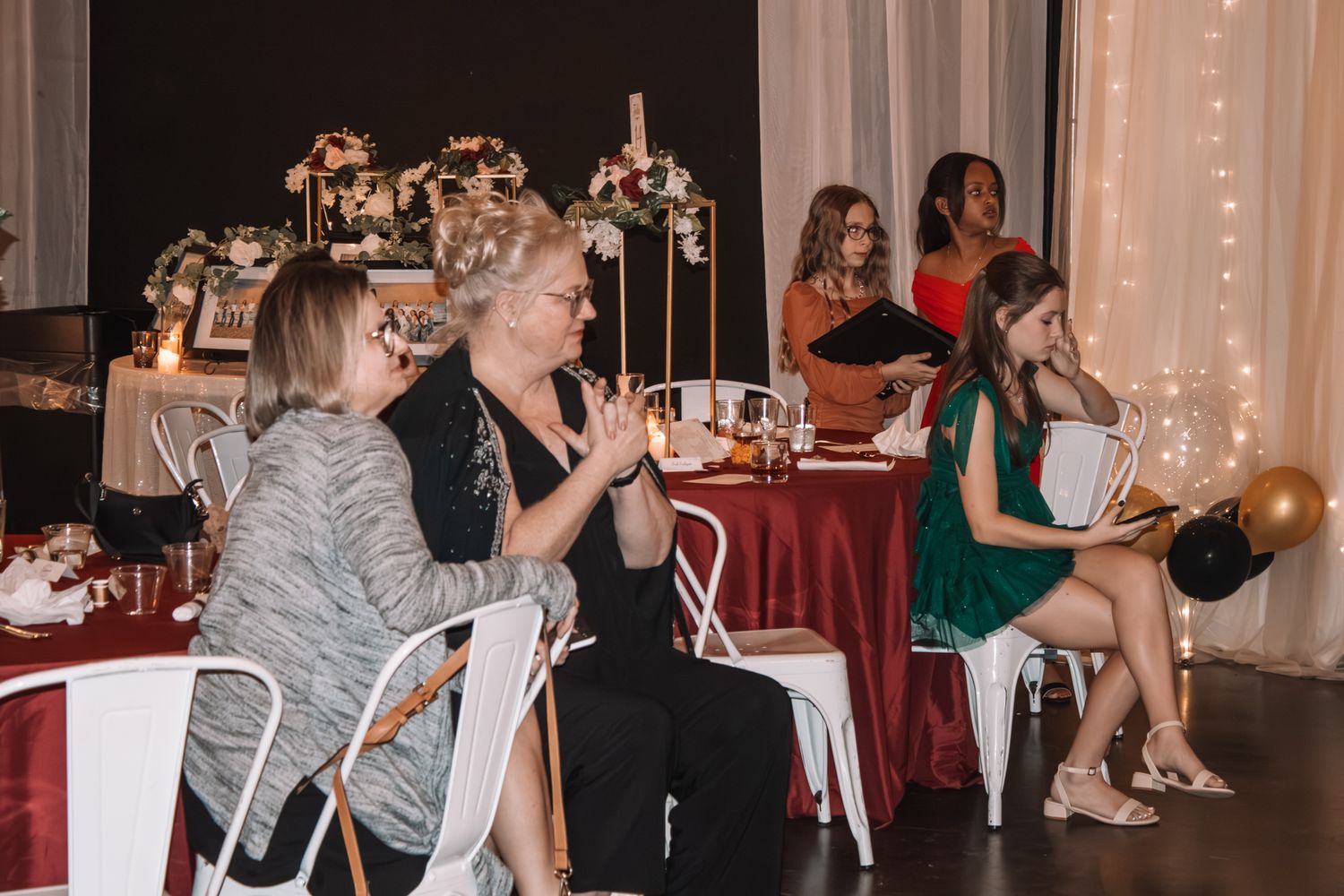 Image of Victoria's School of Dance dancers celebrating at their National Dance Honors Society induction ceremony