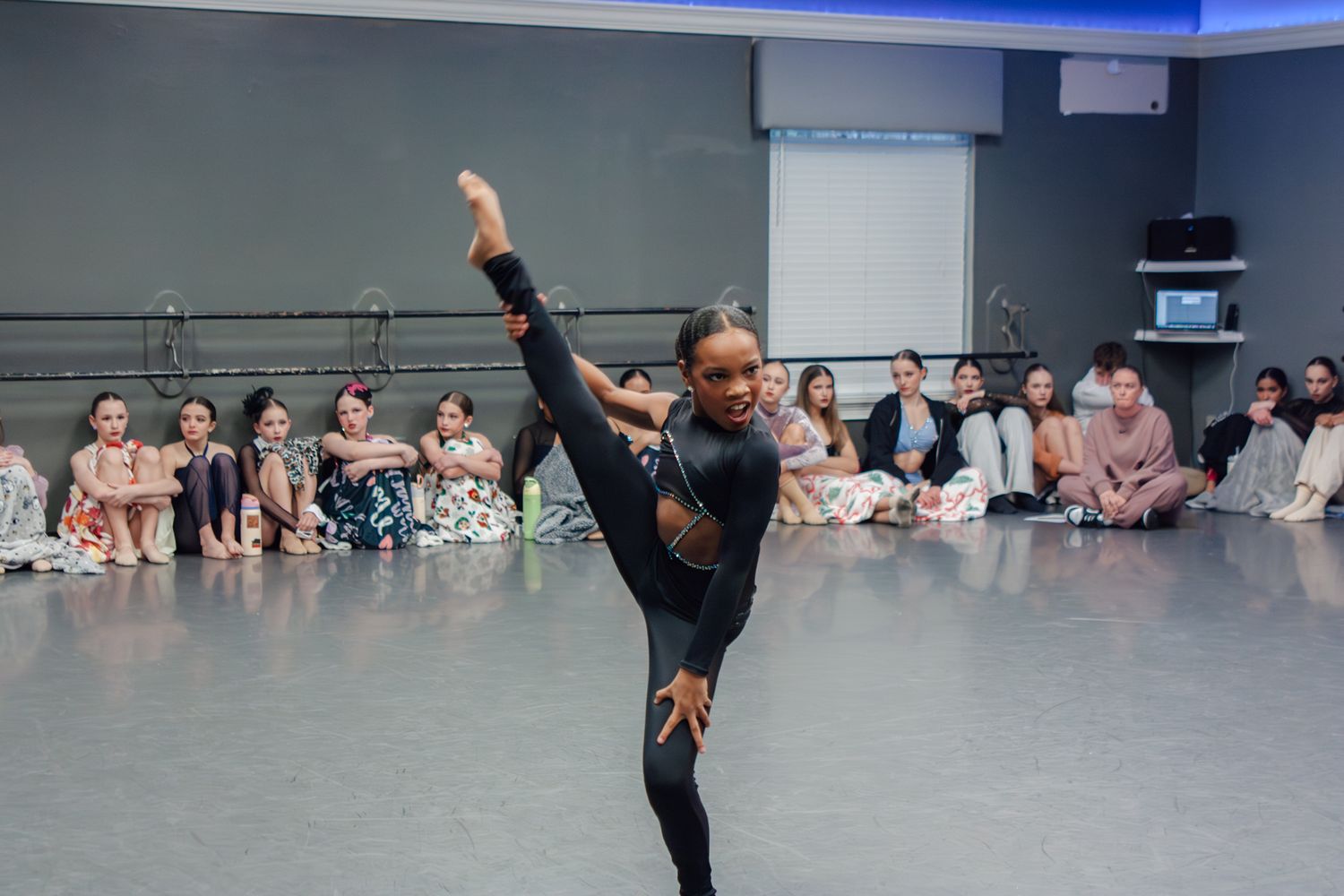 Image of Victoria's School of Dance dancers dancing at their dress rehearsal