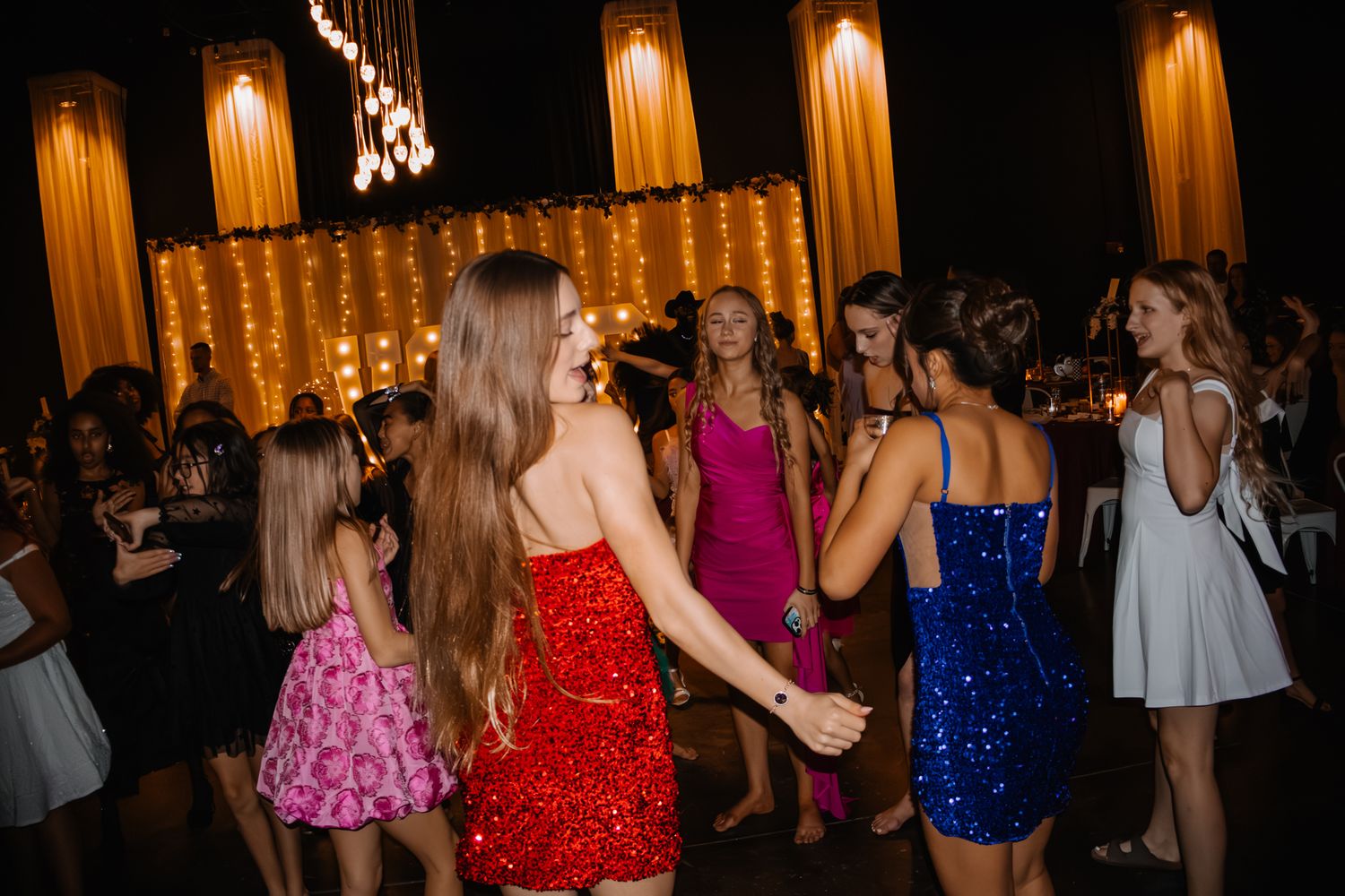 Image of Victoria's School of Dance dancers celebrating at their National Dance Honors Society induction ceremony