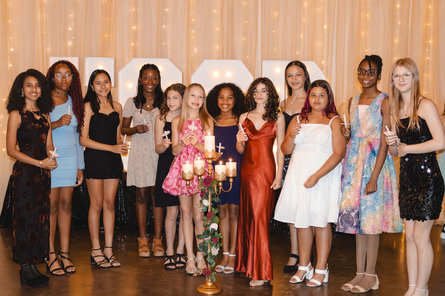 Image of Victoria's School of Dance dancers celebrating at their National Dance Honors Society induction ceremony