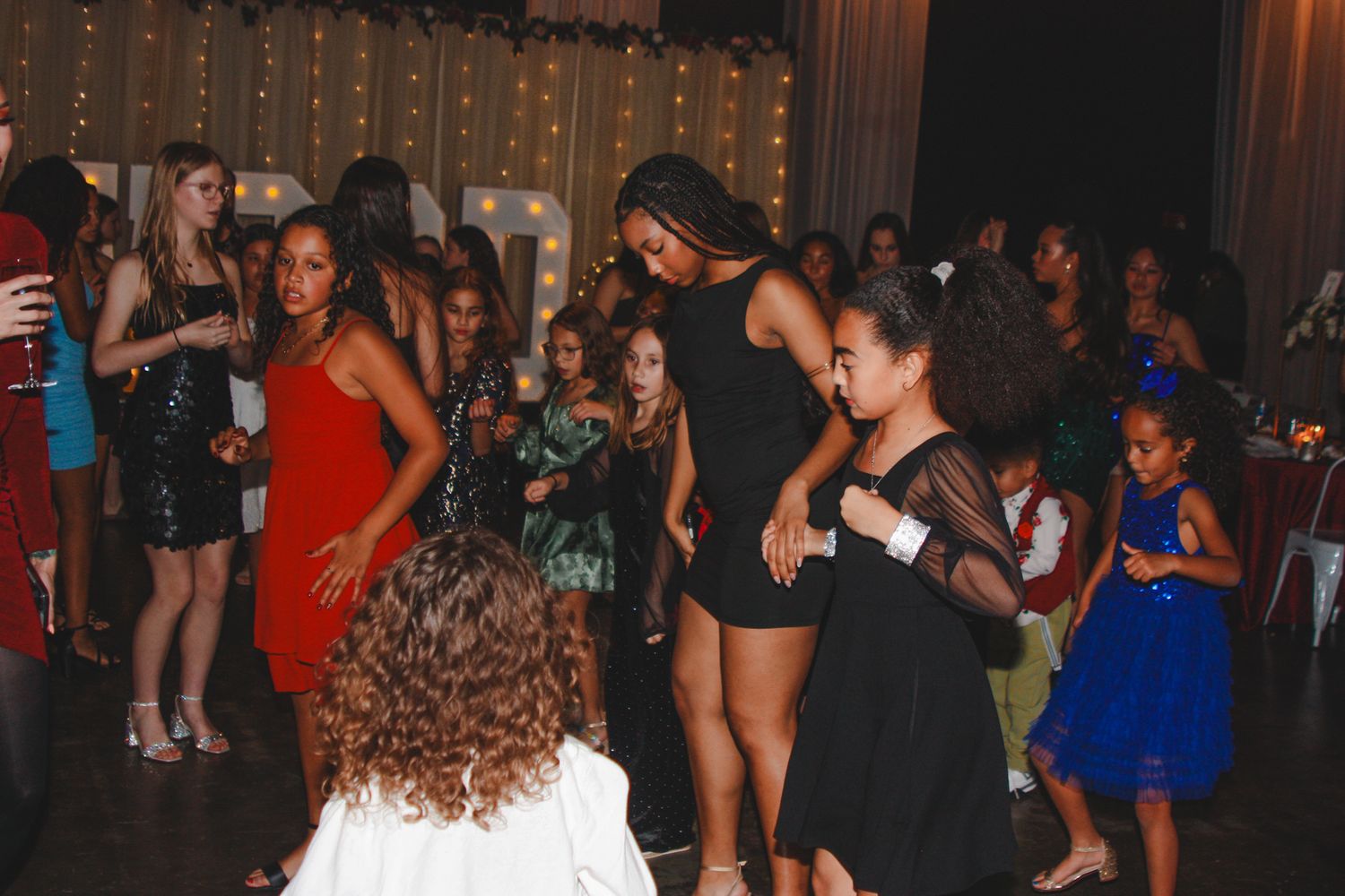 Image of Victoria's School of Dance dancers celebrating at their National Dance Honors Society induction ceremony