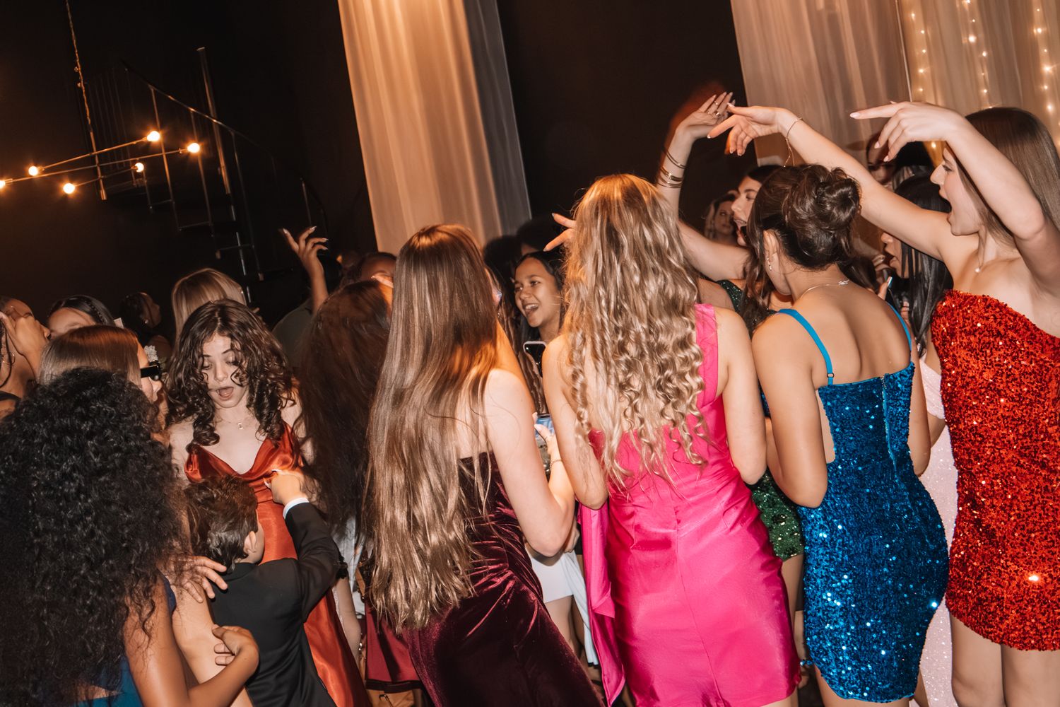Image of Victoria's School of Dance dancers celebrating at their National Dance Honors Society induction ceremony