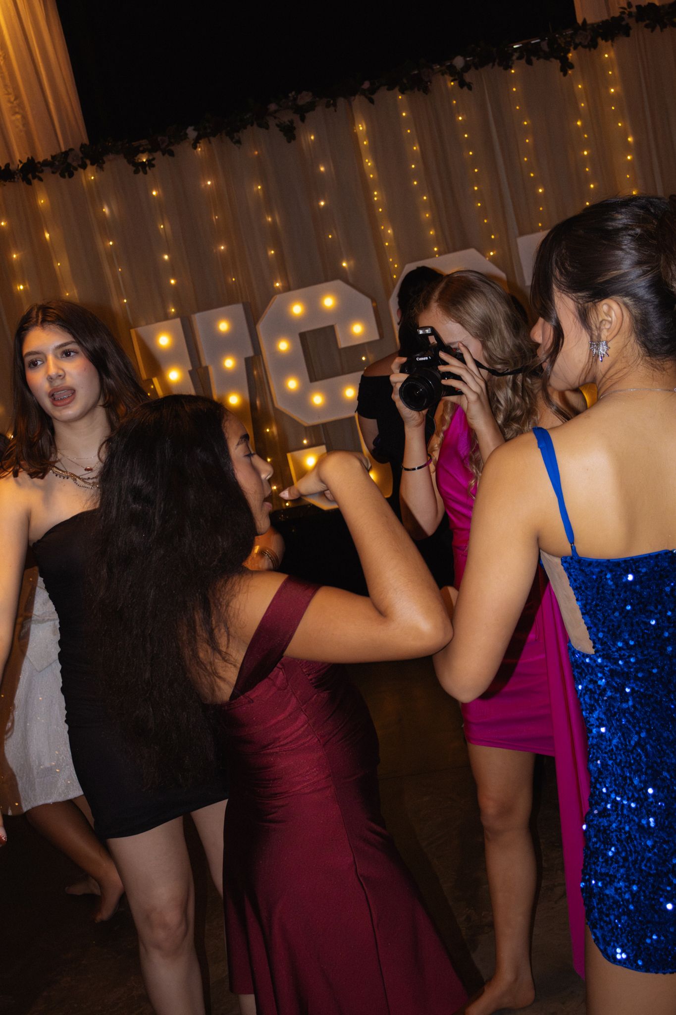 Image of Victoria's School of Dance dancers celebrating at their National Dance Honors Society induction ceremony
