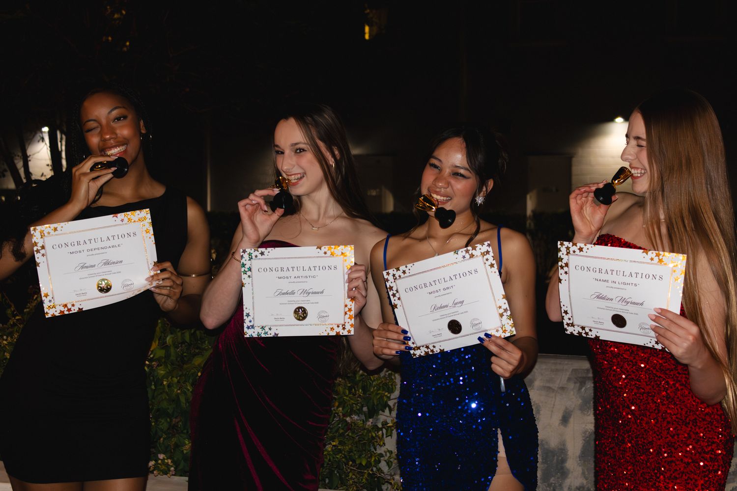 Image of Victoria's School of Dance dancers celebrating at their National Dance Honors Society induction ceremony