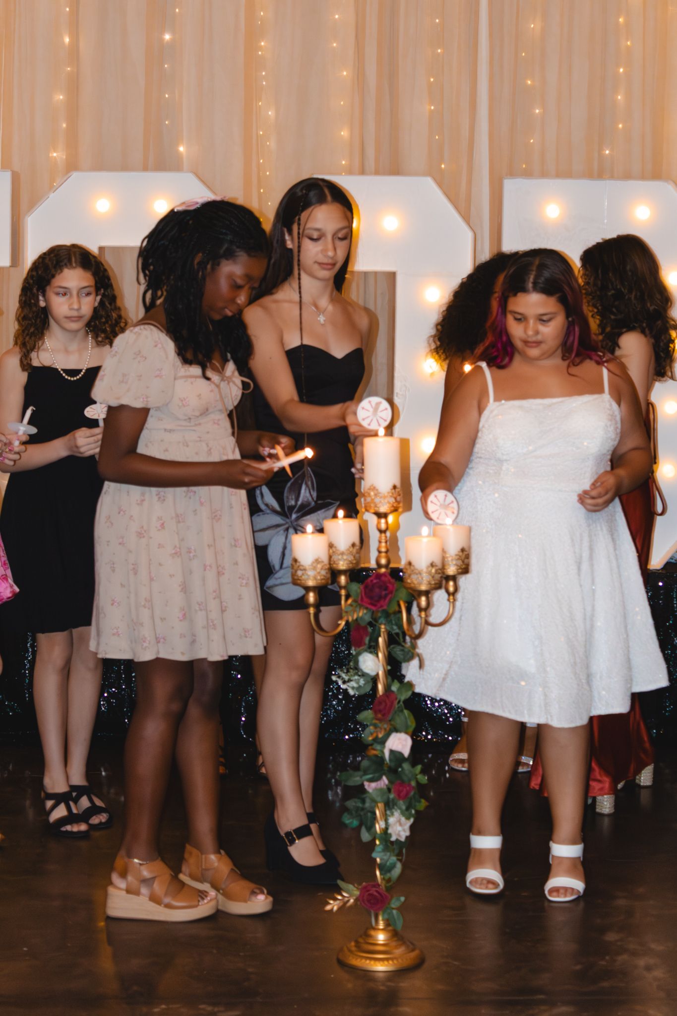 Image of Victoria's School of Dance dancers celebrating at their National Dance Honors Society induction ceremony