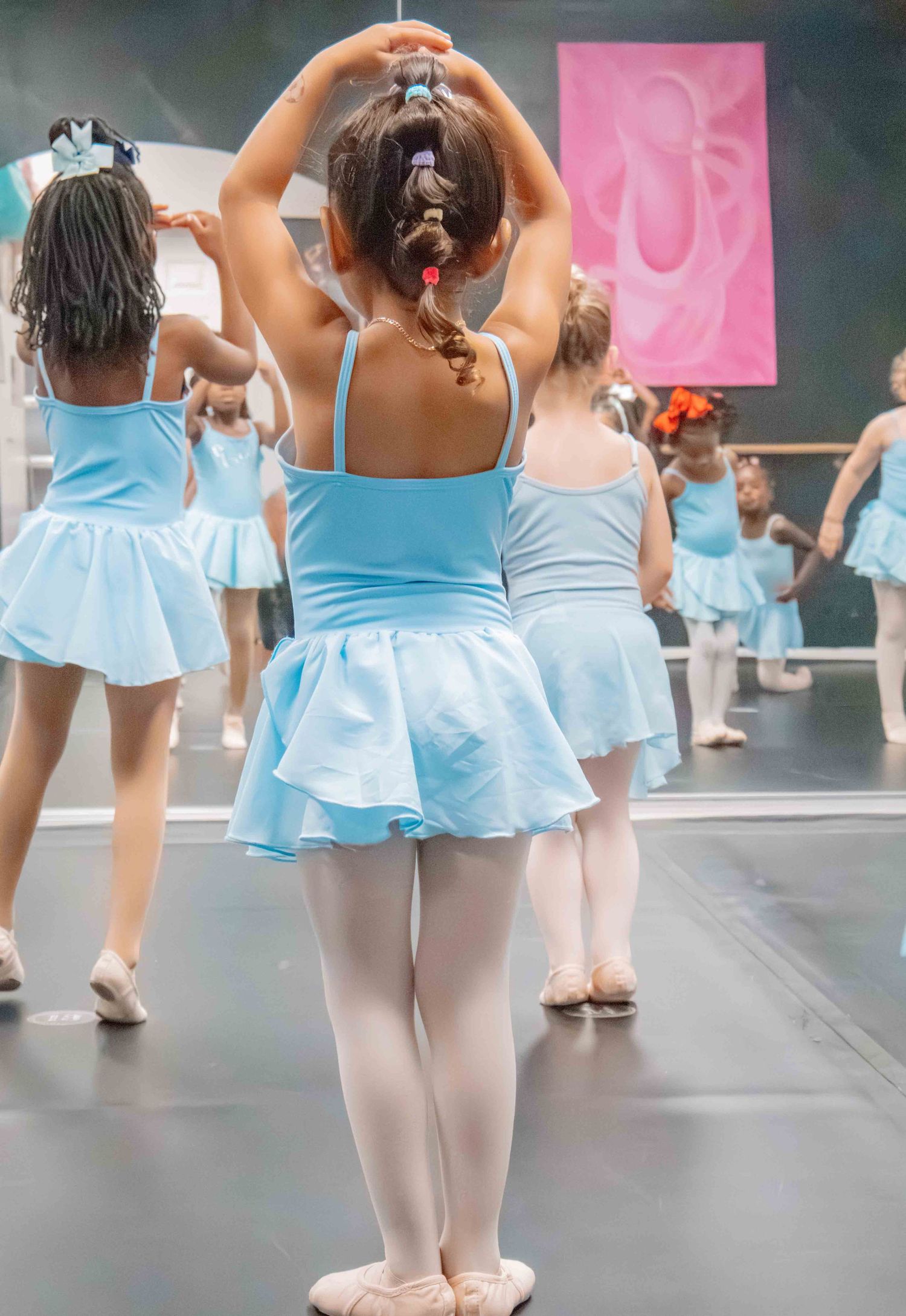 Image of dancers at Amretta's Grand Jete Dance Company dancing in their classes