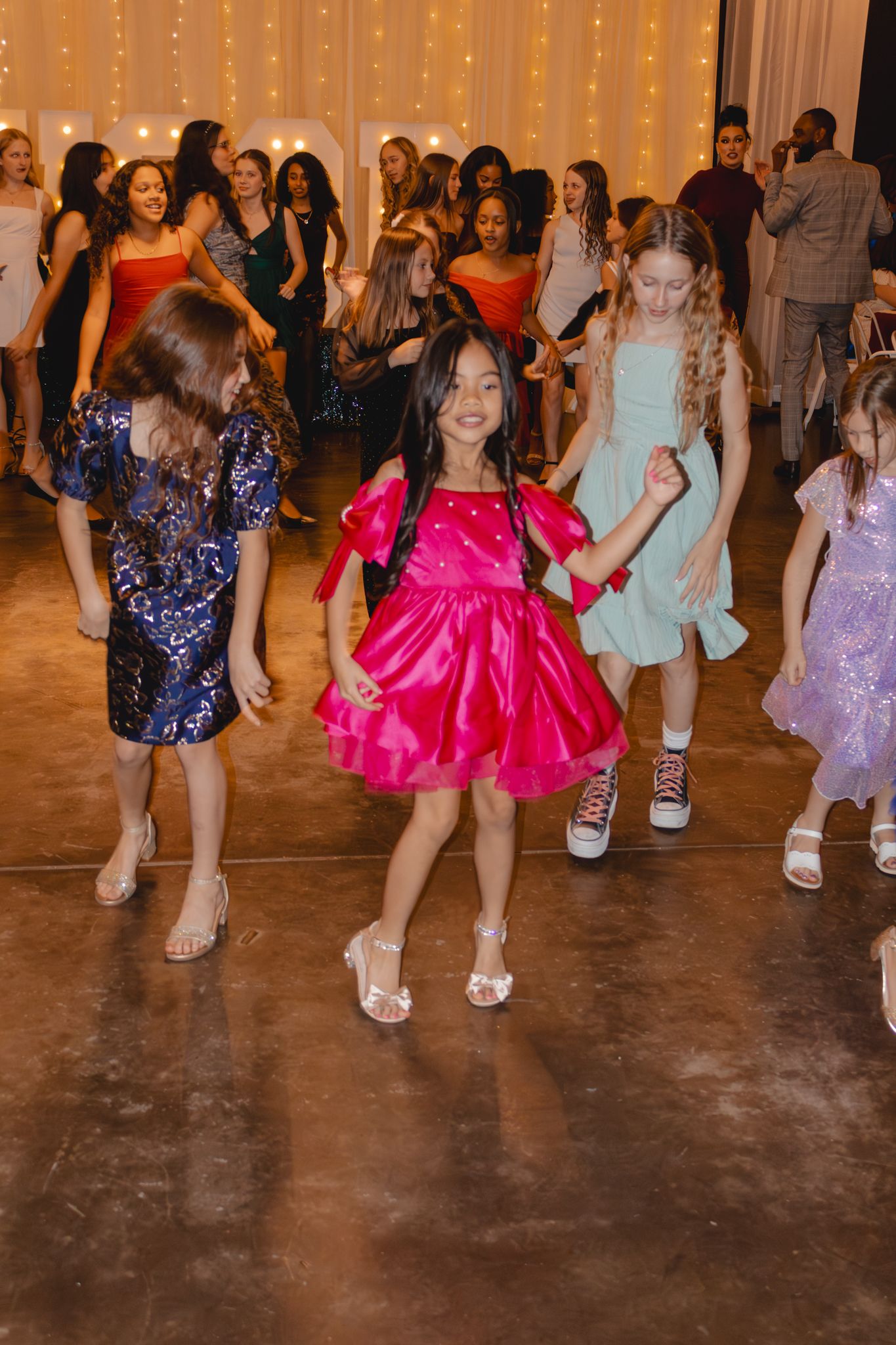 Image of Victoria's School of Dance dancers celebrating at their National Dance Honors Society induction ceremony