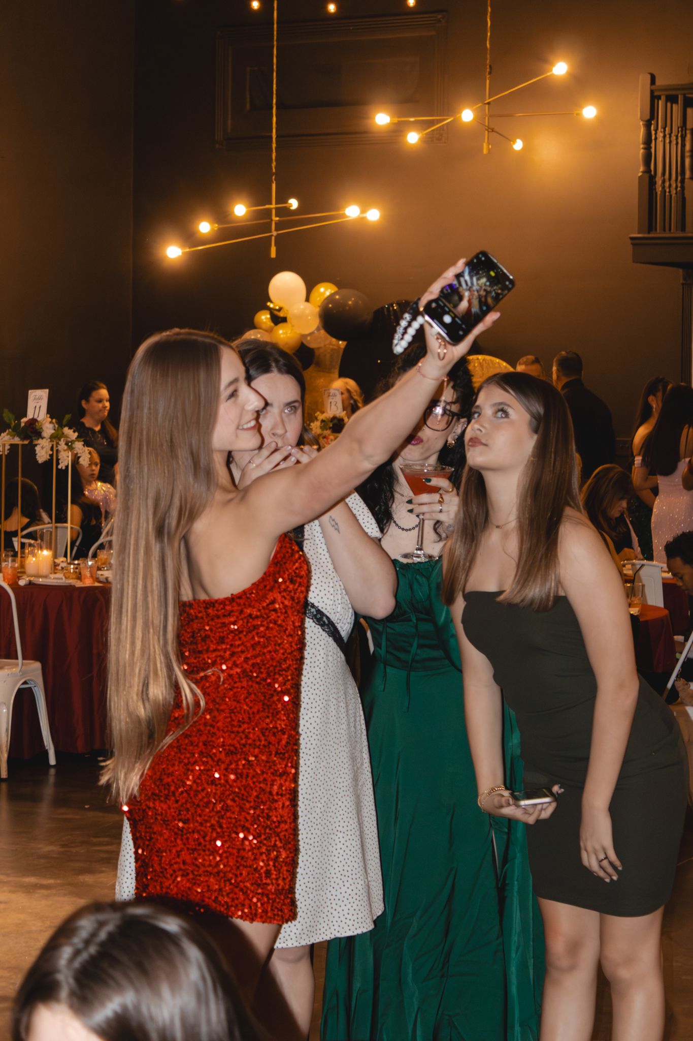 Image of Victoria's School of Dance dancers celebrating at their National Dance Honors Society induction ceremony