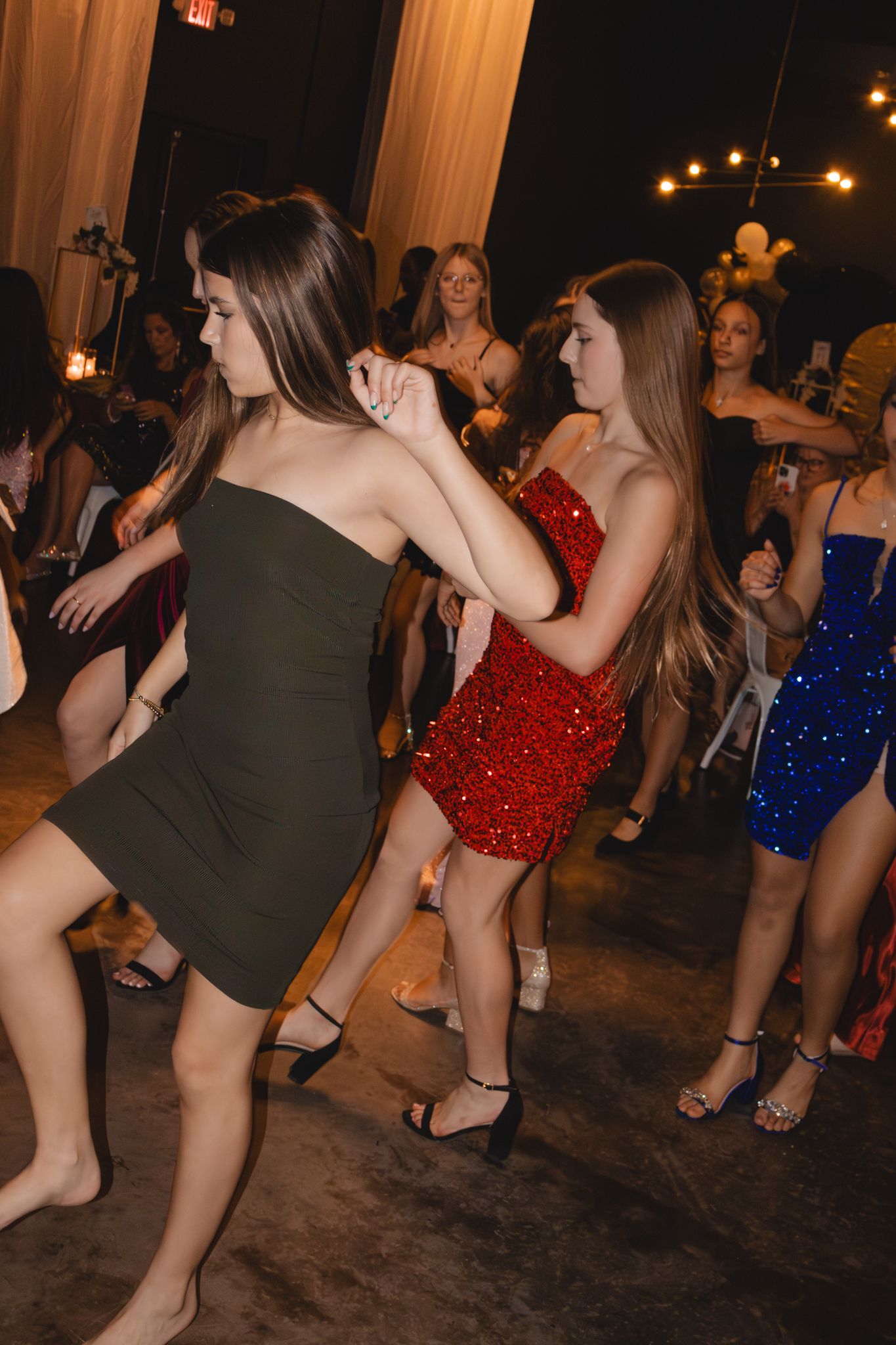 Image of Victoria's School of Dance dancers celebrating at their National Dance Honors Society induction ceremony