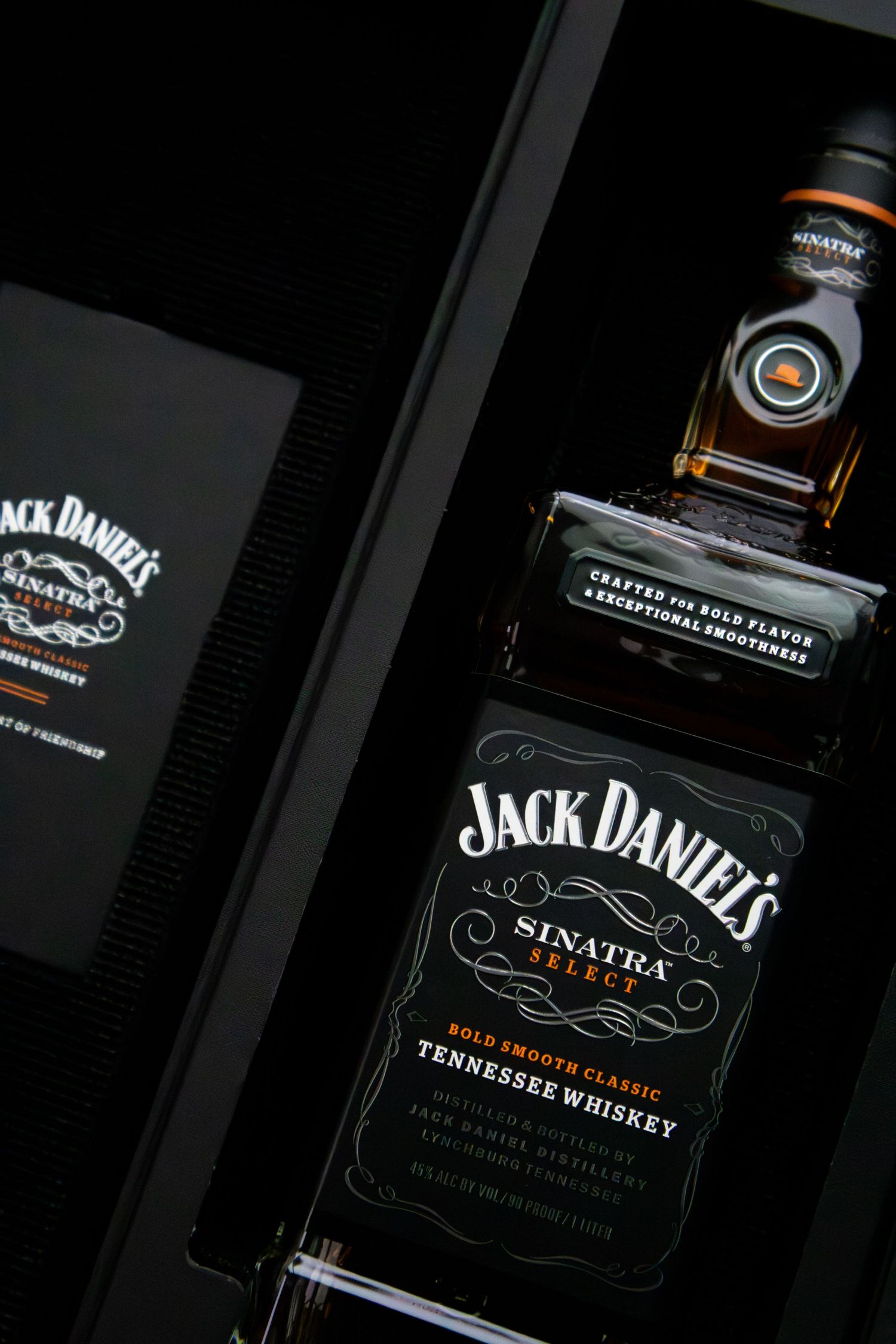 Jack Daniel's Sinatra Select Bold Smooth Classic Tennessee Whiskey bottle displayed in a premium black gift box.