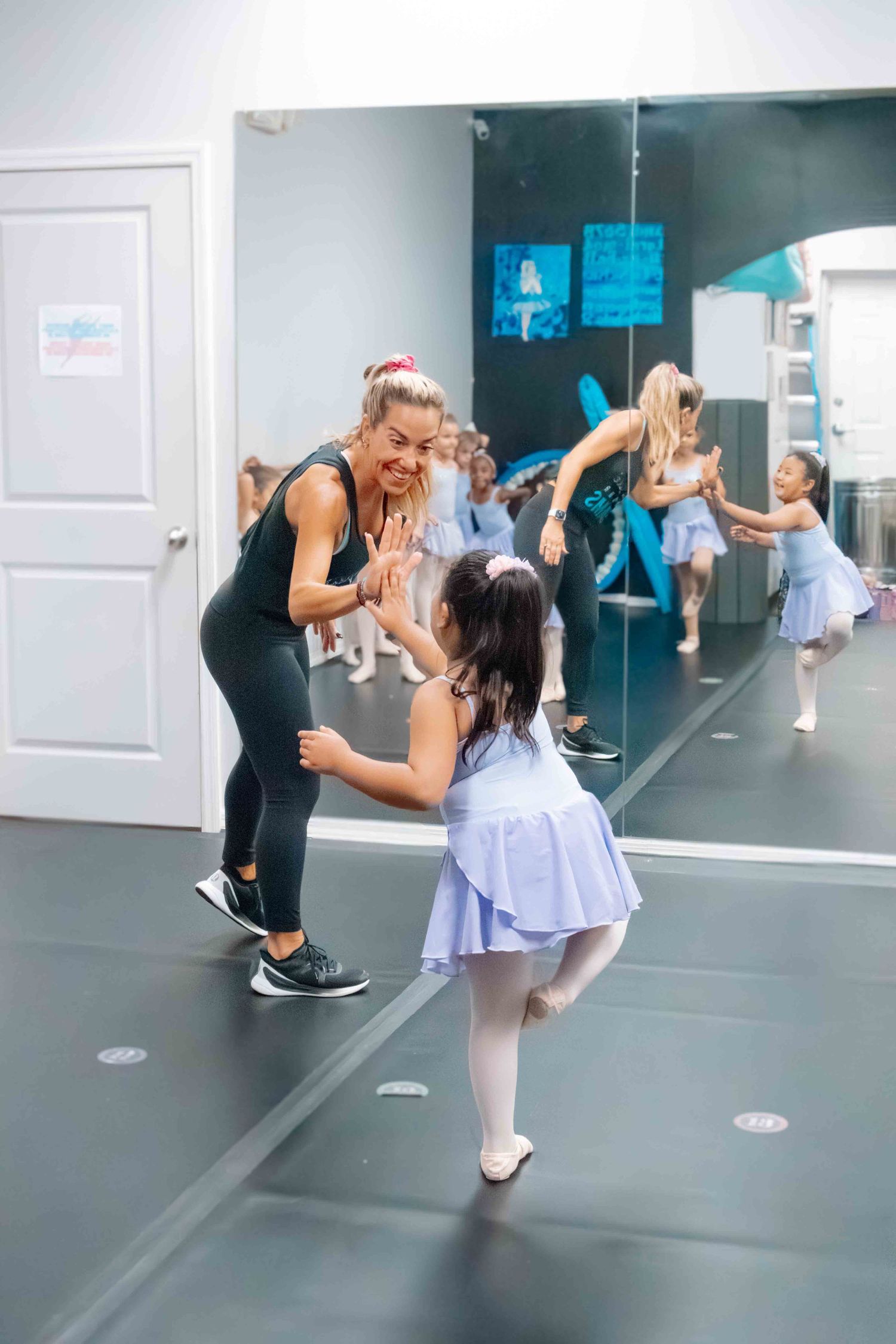 Image of dancers at Amretta's Grand Jete Dance Company dancing in their classes