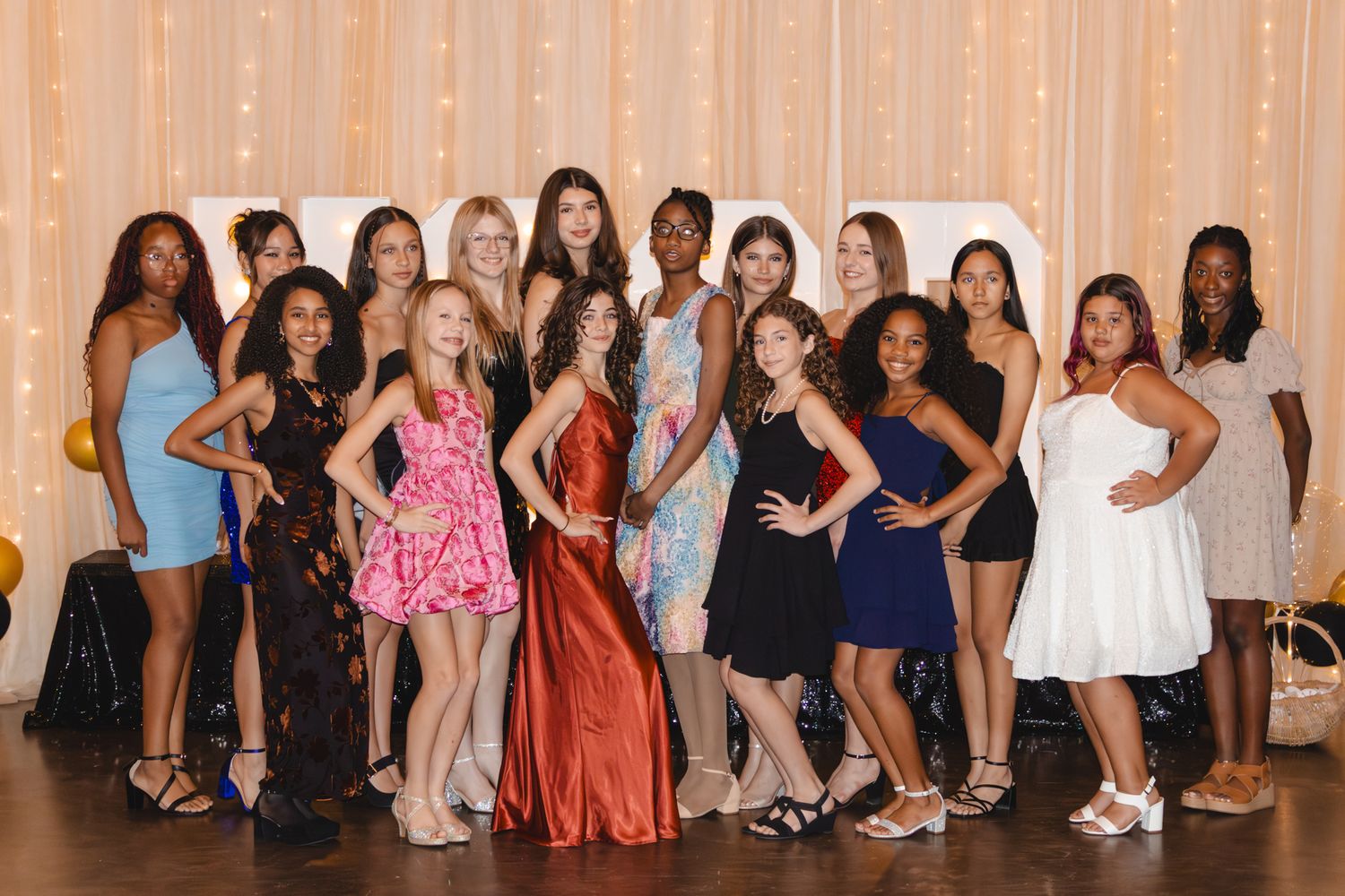 Image of Victoria's School of Dance dancers celebrating at their National Dance Honors Society induction ceremony