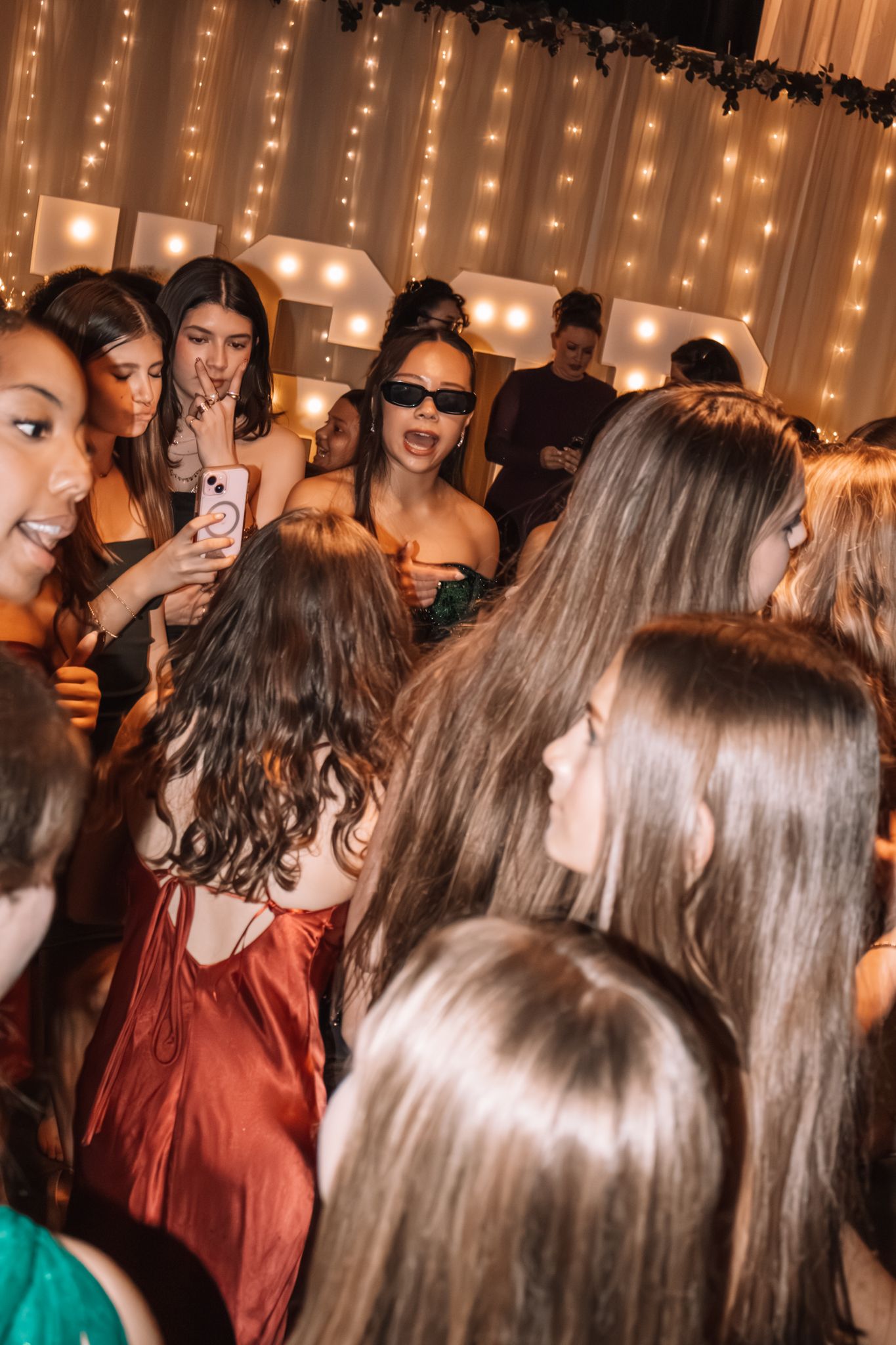 Image of Victoria's School of Dance dancers celebrating at their National Dance Honors Society induction ceremony