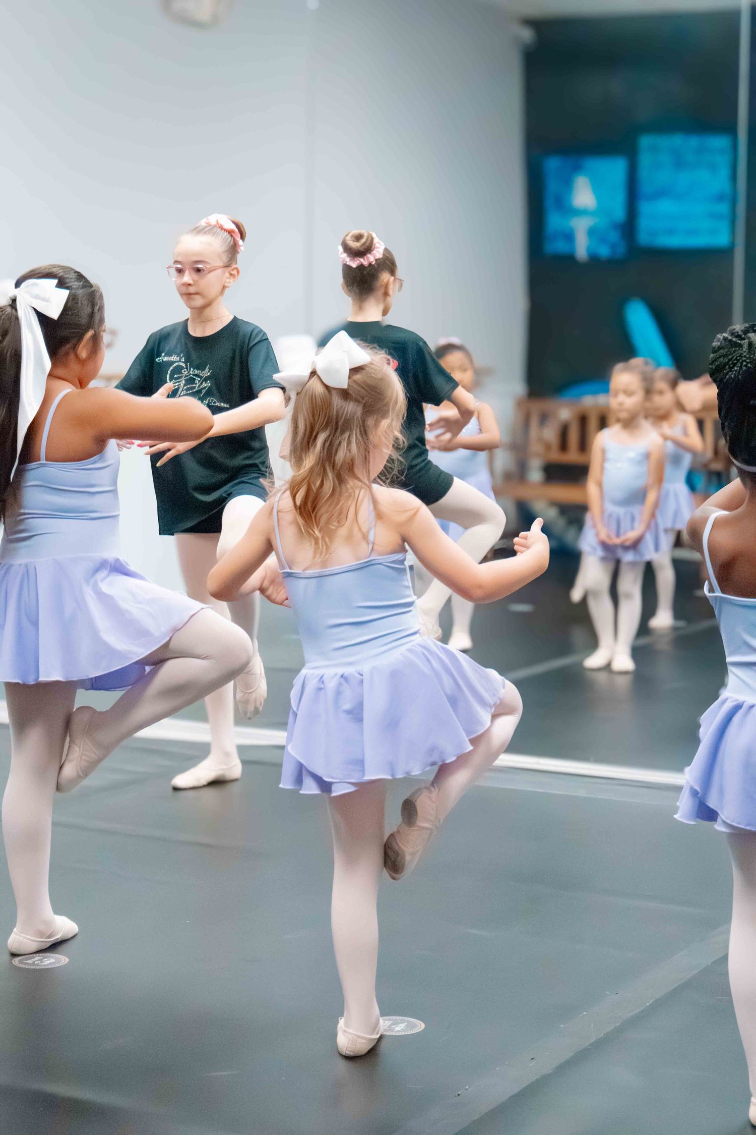 Image of dancers at Amretta's Grand Jete Dance Company dancing in their classes