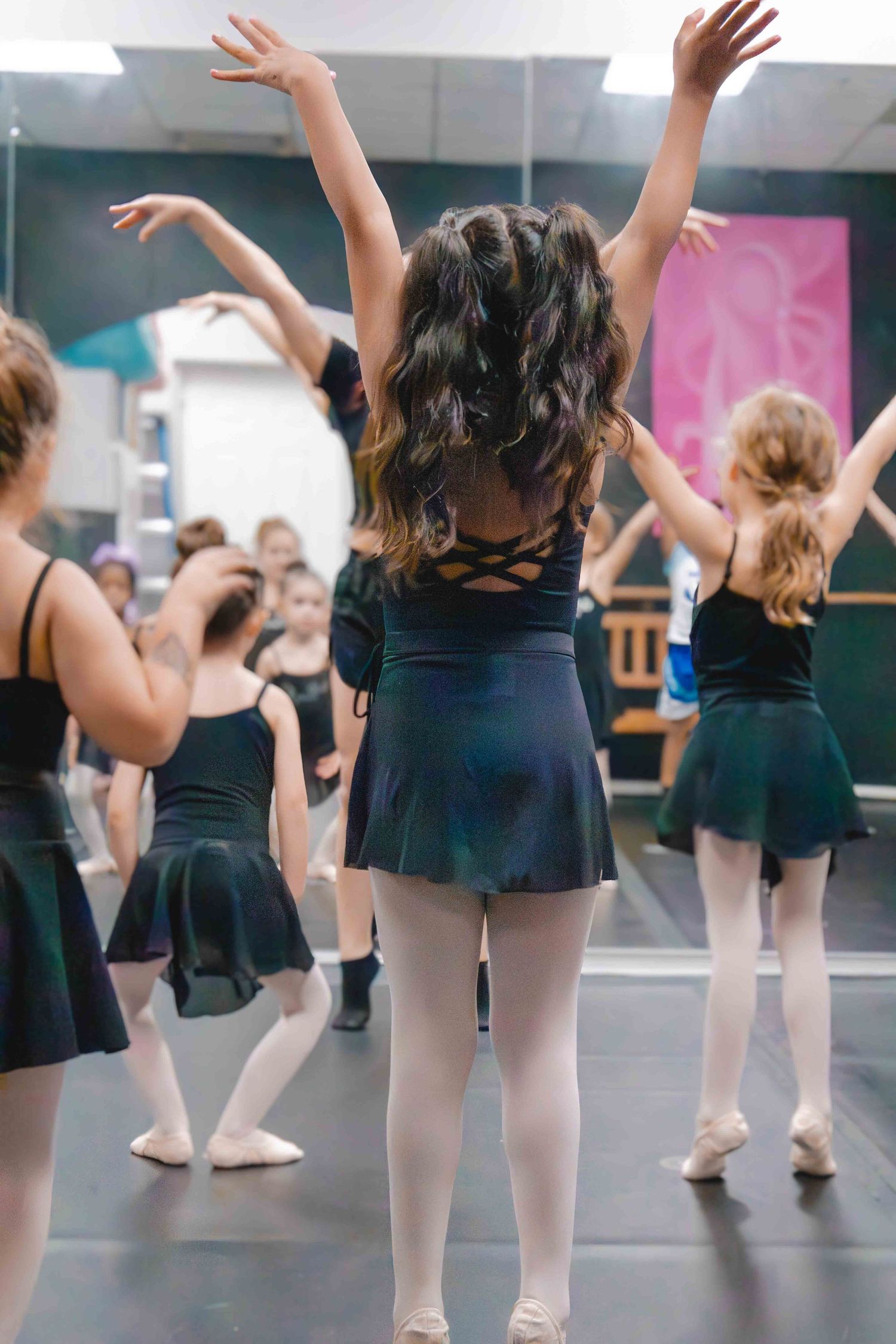 Image of dancers at Amretta's Grand Jete Dance Company dancing in their classes