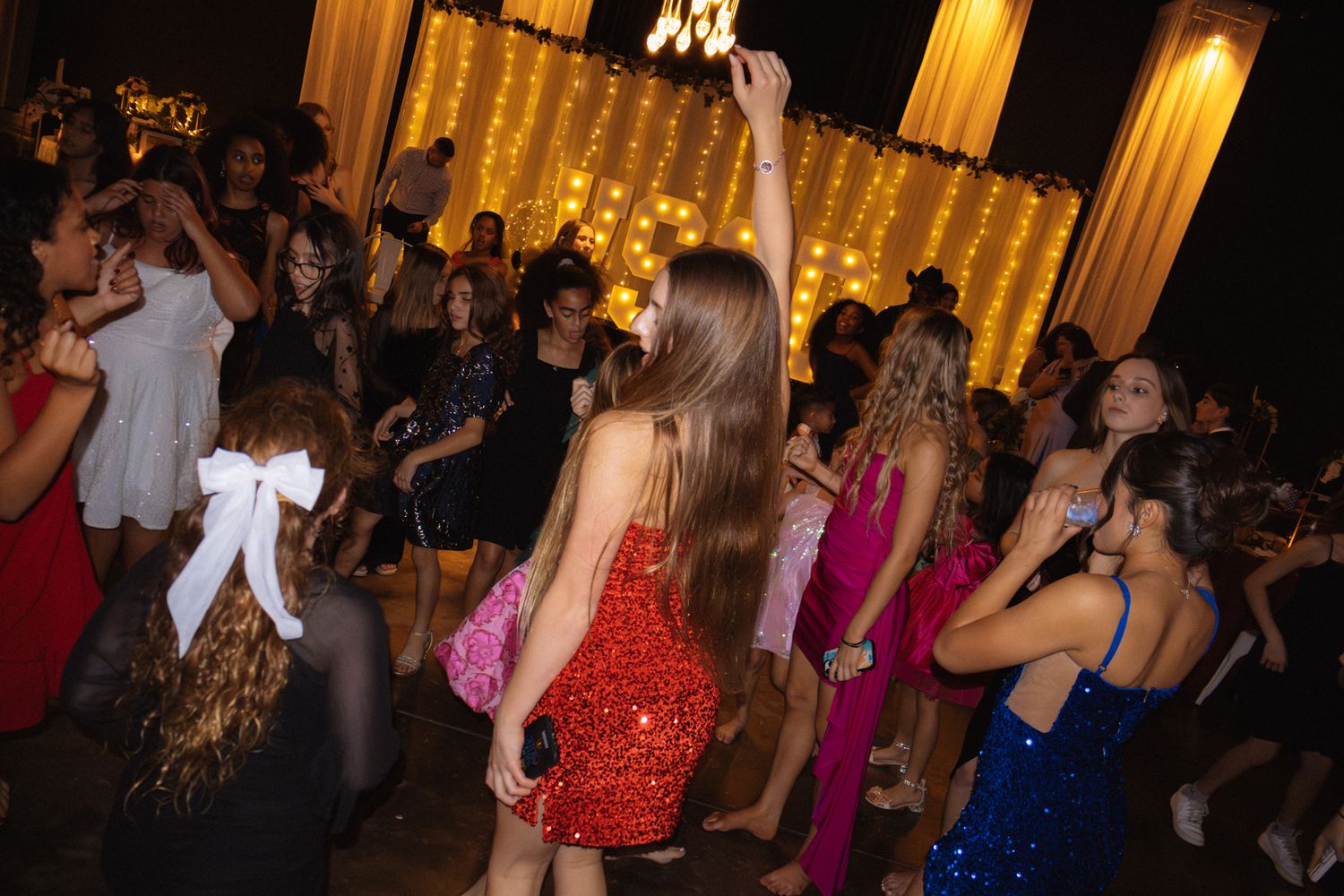Image of Victoria's School of Dance dancers celebrating at their National Dance Honors Society induction ceremony
