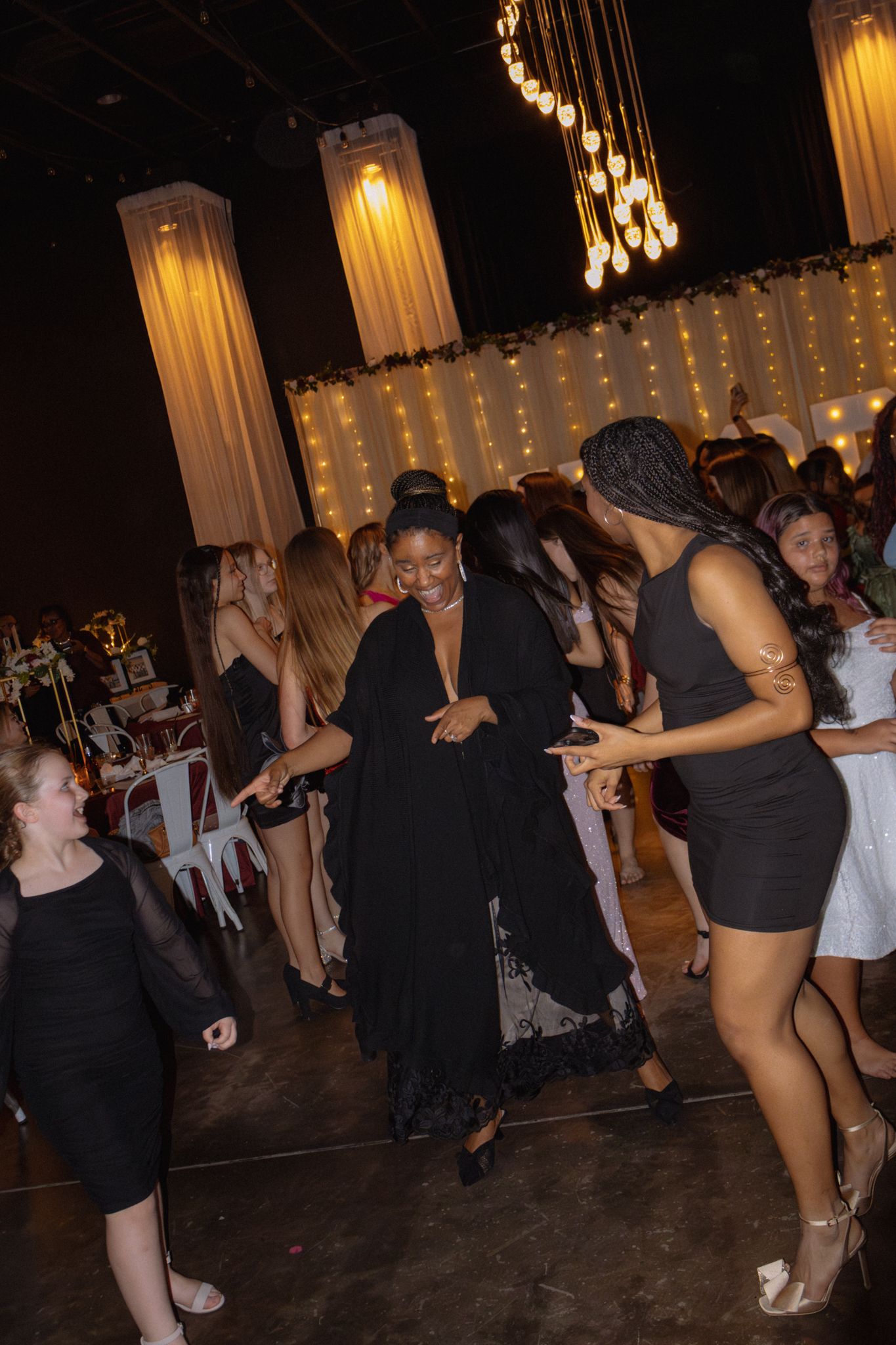 Image of Victoria's School of Dance dancers celebrating at their National Dance Honors Society induction ceremony