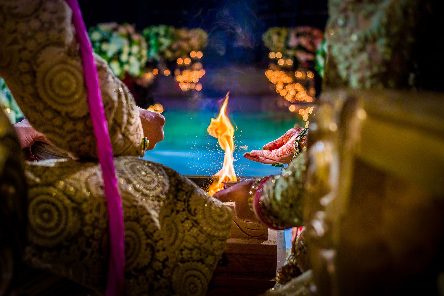 Colorful wedding decor with vibrant flames and ornate details.