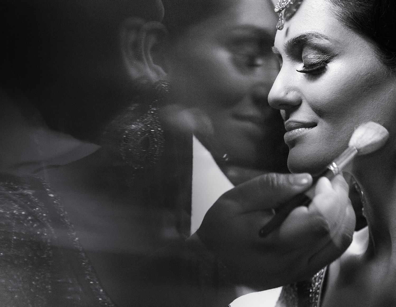 Intimate black and white wedding portraits captured in romantic close-up moments.