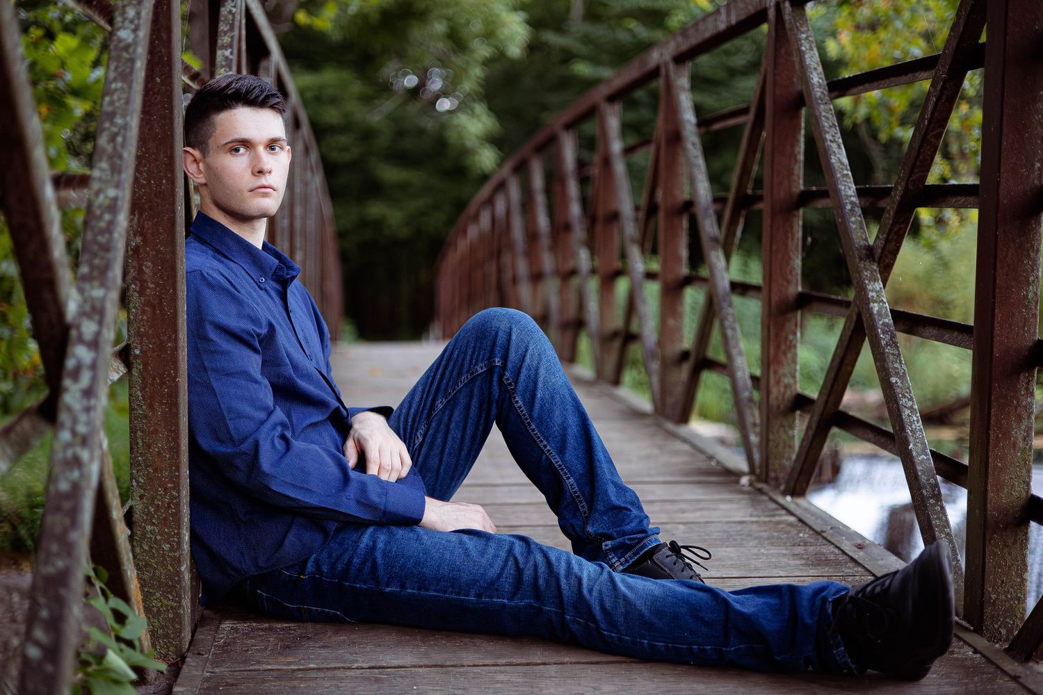 Senior session located on the bridge at Ritter Springs in the ozark