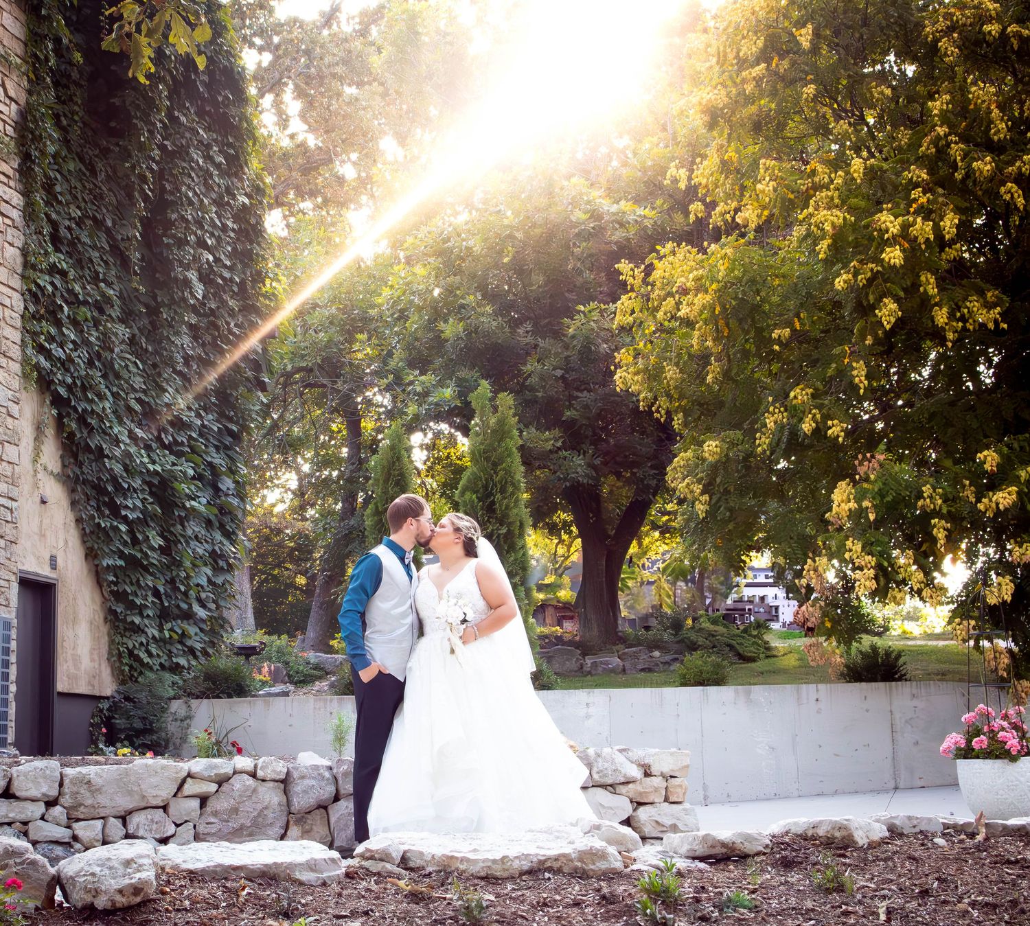 Bride and groom kissing at the reception in Cassville mo