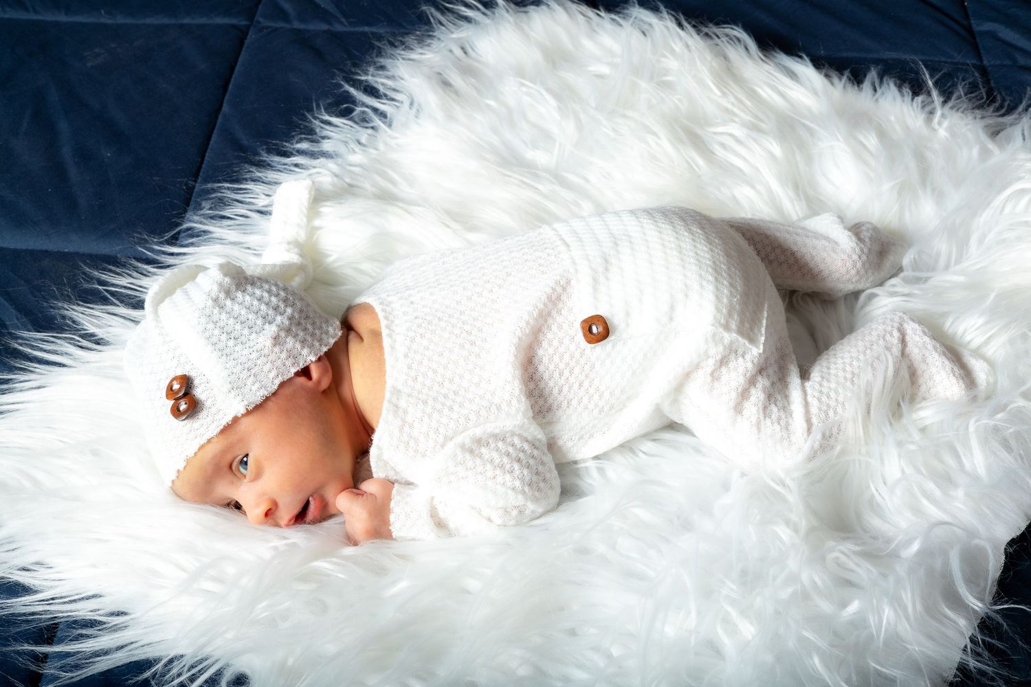 a baby boy Newborn lifestyle session during a family session in Pleasant Hope MO at their home.