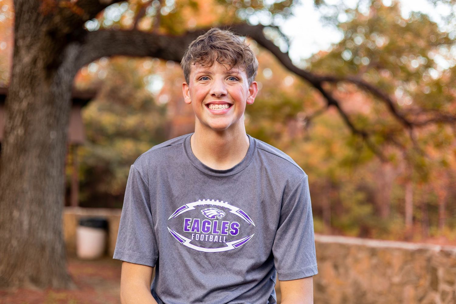 Fair Grove football player senior session in the 417 area at a local park